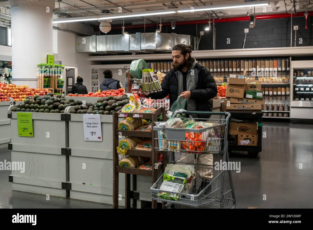 Shopping in a Whole Foods Market supermarket in New York on Friday, March 29, 2024. (© Richard B. Levine) Stock Photo
