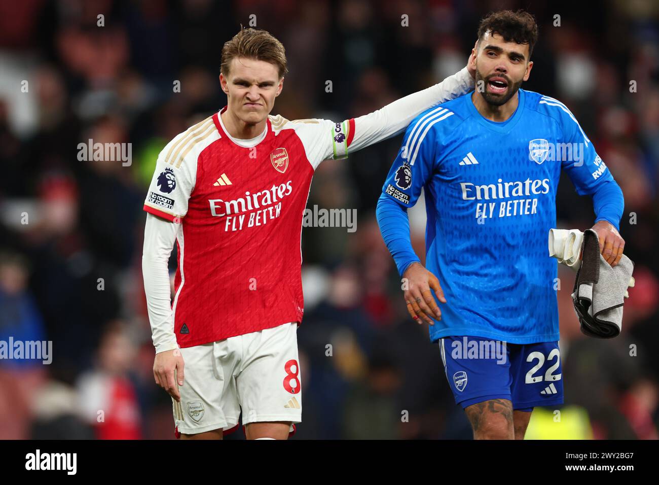 Emirates Stadium, London, UK. 3rd Apr, 2024. Premier League Football, Arsenal versus Luton Town; Martin Odegaard of Arsenal celebrates the 2-0 win with David Raya Credit: Action Plus Sports/Alamy Live News Stock Photo