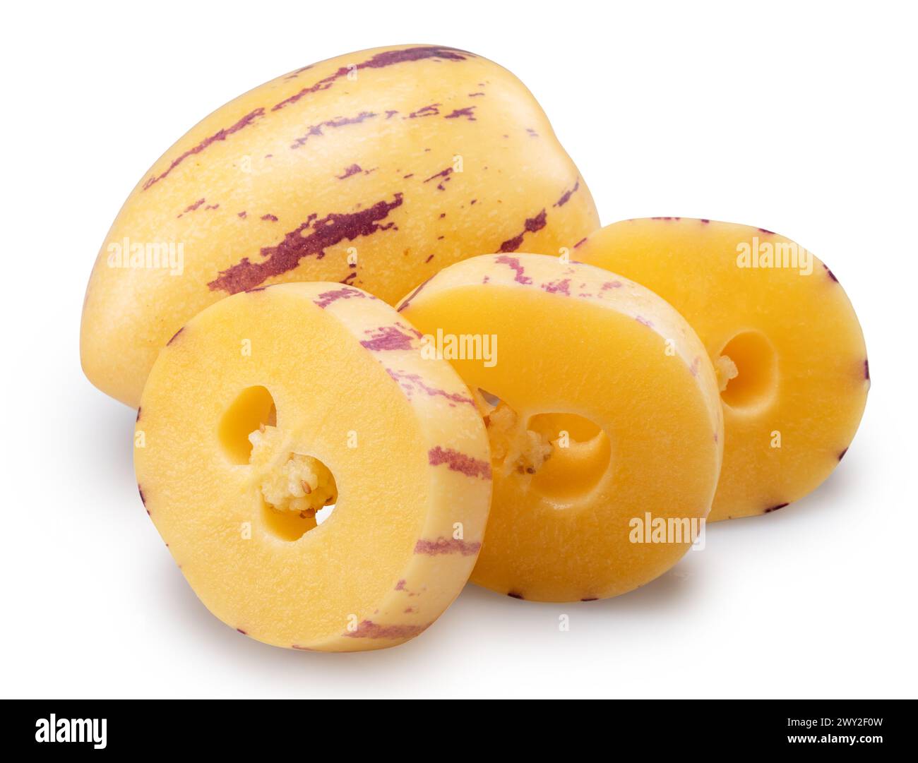 Pepino melon or pepino dulce and sliced fruit isolated on white background. Clipping path. Stock Photo