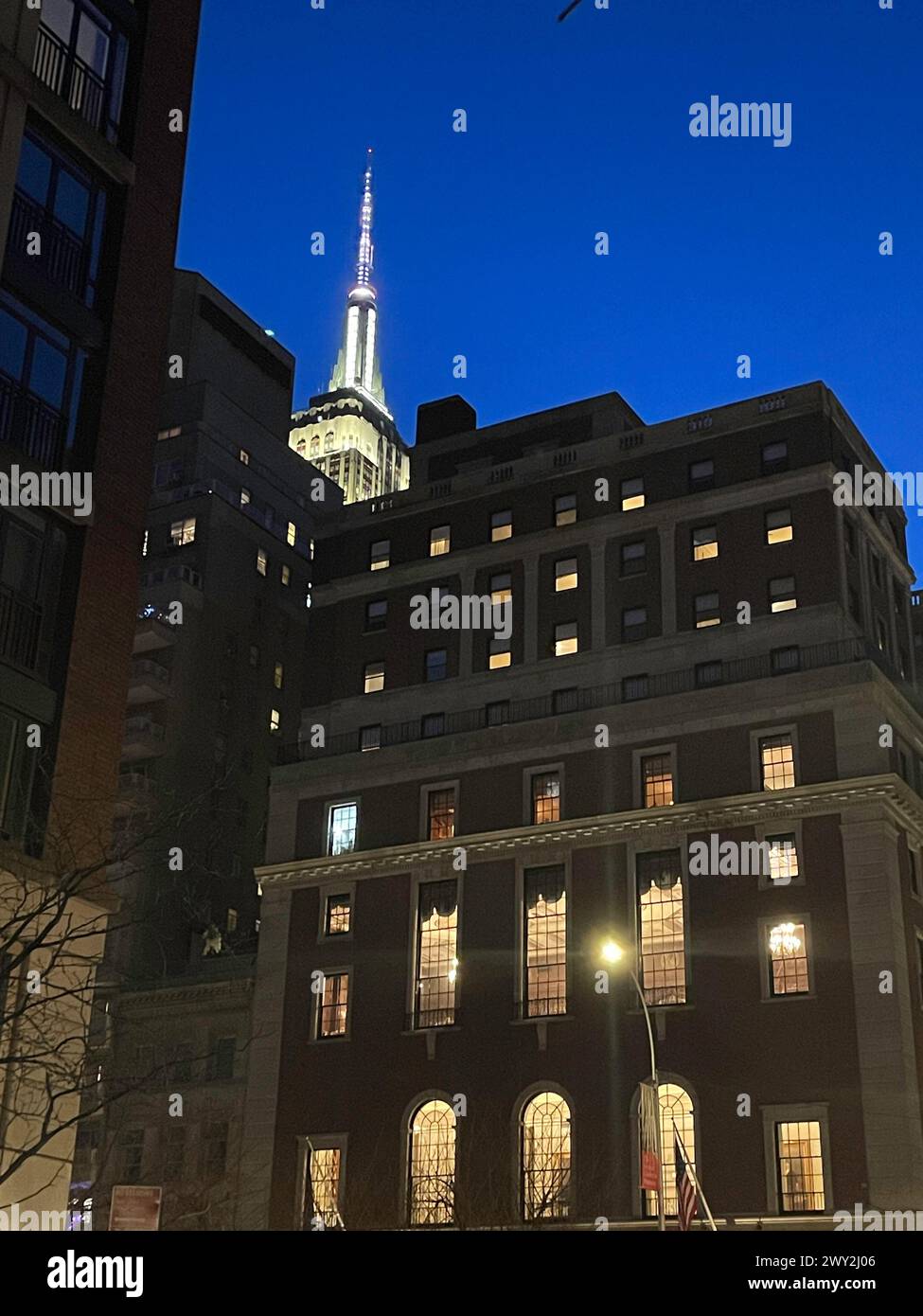 An evening in Murray Hill with the Empire State building lit in the background, E. 37th St. 2024, New York City, USA Stock Photo