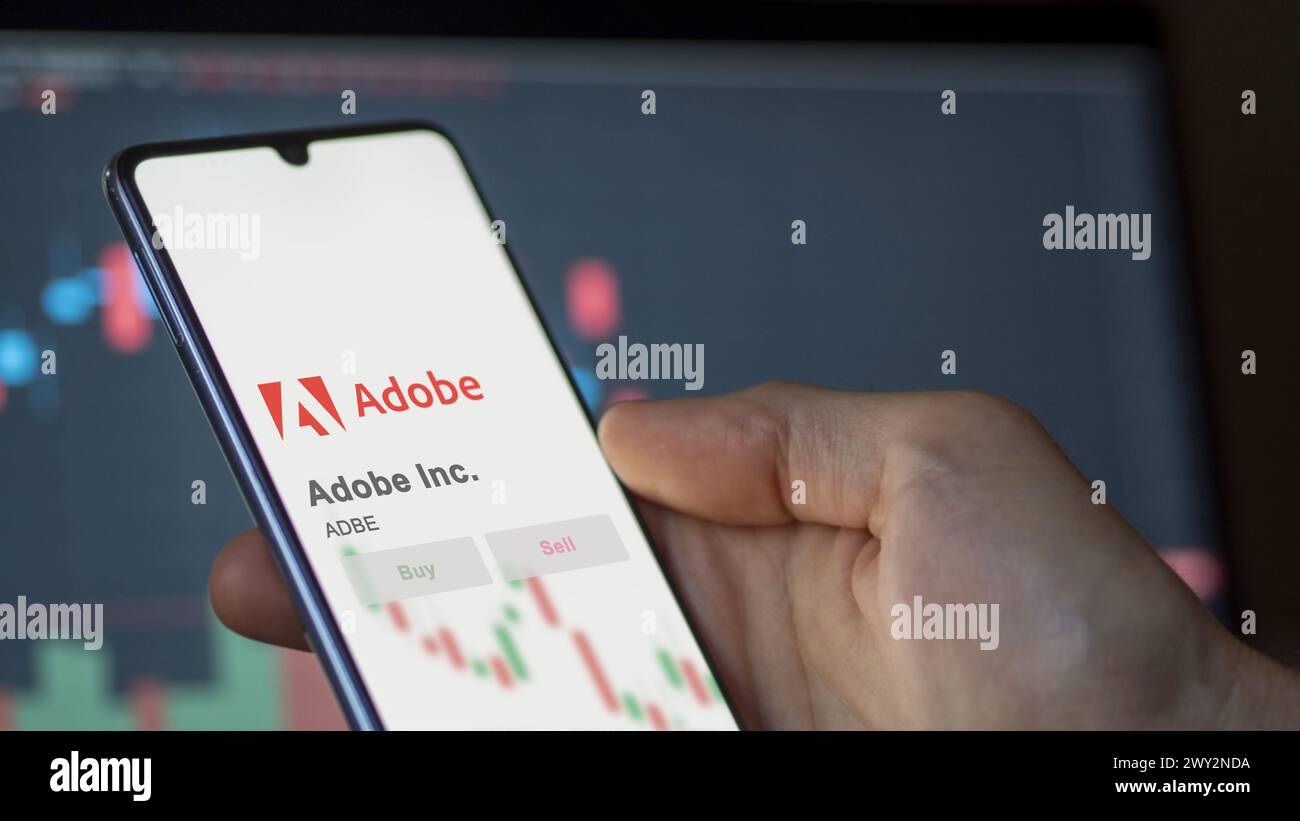 April 17th 2024 , San Jose, California. Close up on logo of Adobe Inc. on the screen of an exchange. Adobe Inc  price stocks, $ADBE on a device. Stock Photo