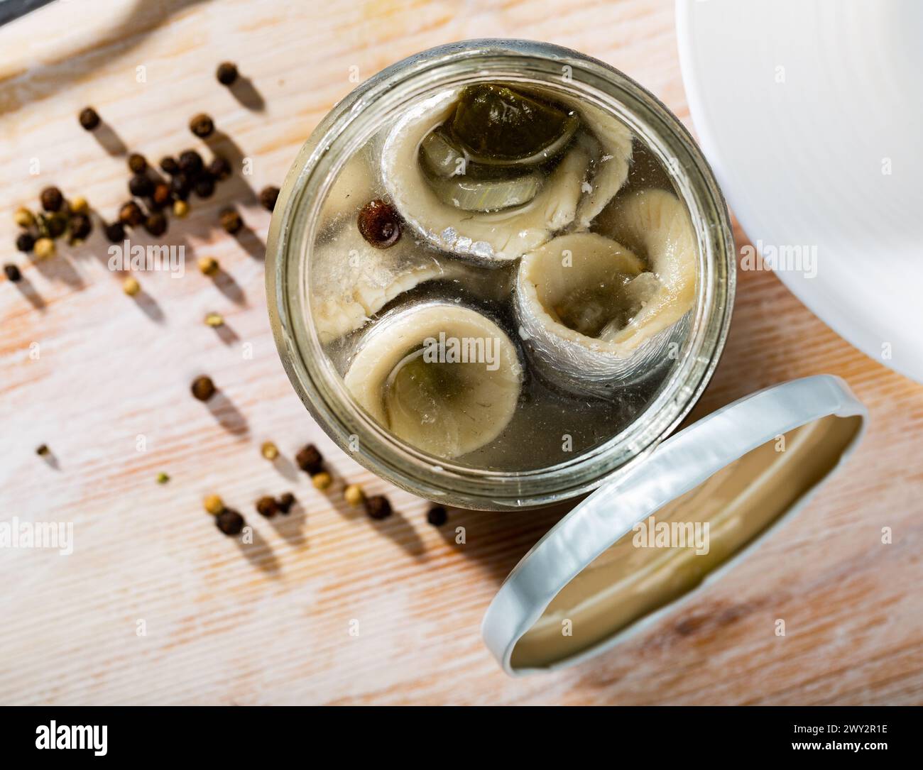 Marinated herring with onions in a glass jar Stock Photo Alamy