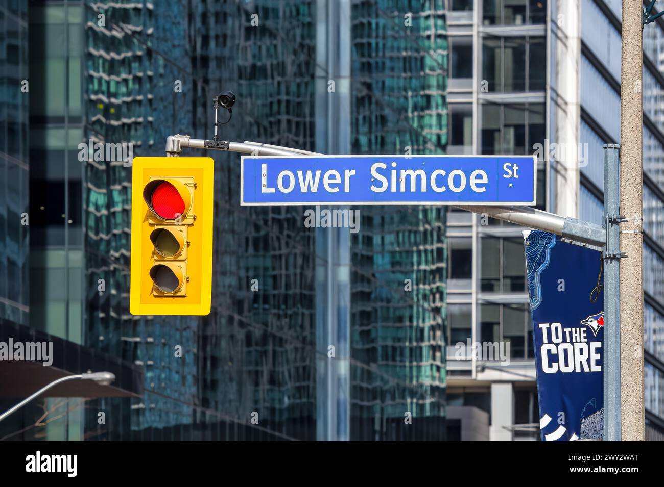 Stop light and street name sign in Simcoe Street, Toronto, Canada Stock Photo