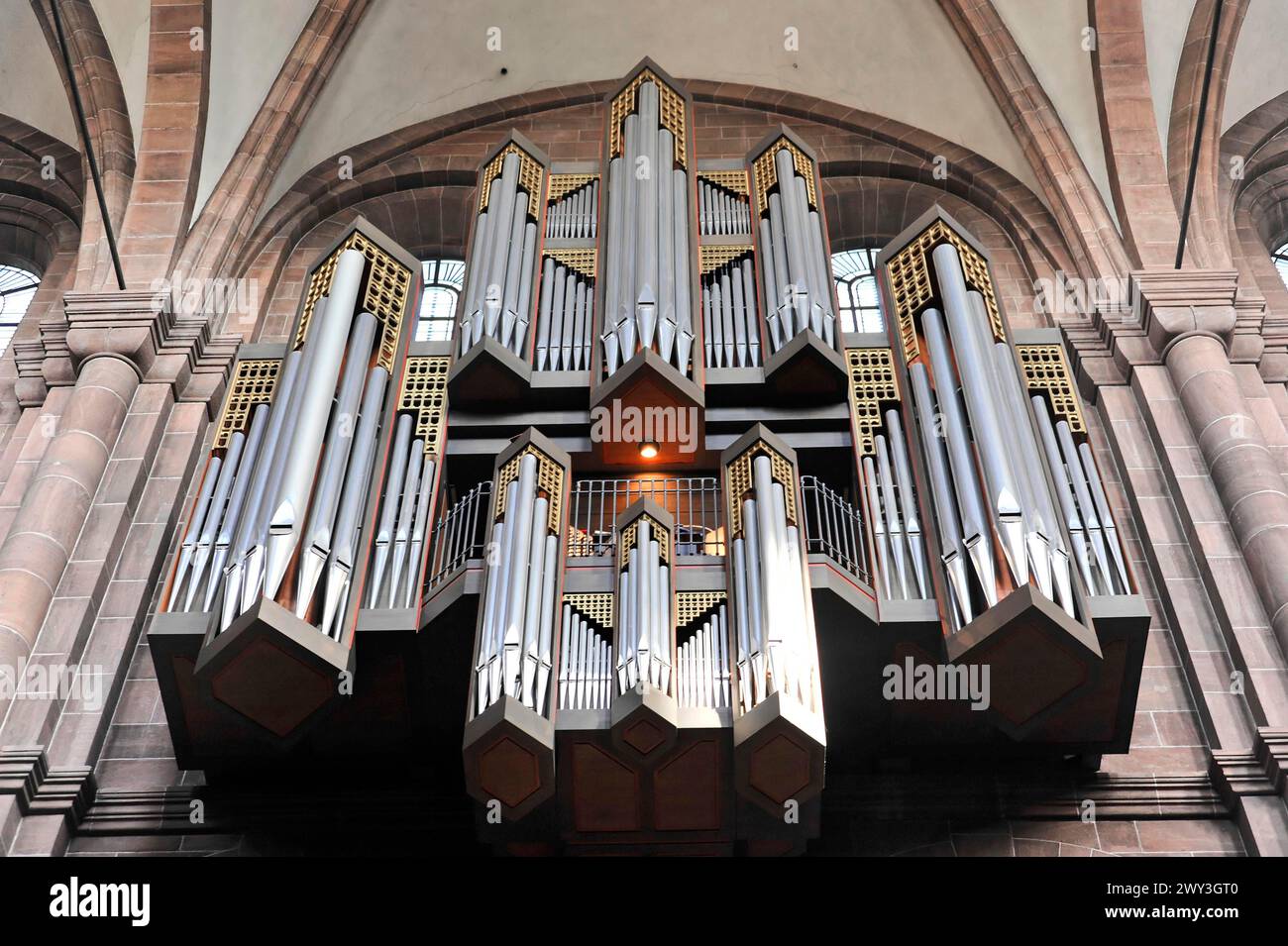 Speyer Cathedral, A large church organ with numerous pipes stands in the Gothic church interior, Speyer Cathedral, Unesco World Heritage Site Stock Photo