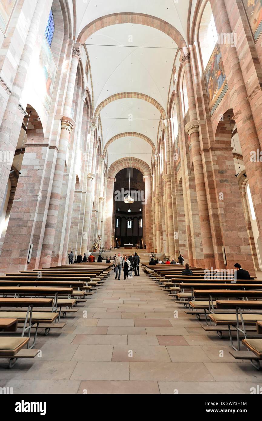 Speyer Cathedral, Wide church interior with visitors and an impressive pillar structure in daylight, Speyer Cathedral, Unesco World Heritage Site Stock Photo