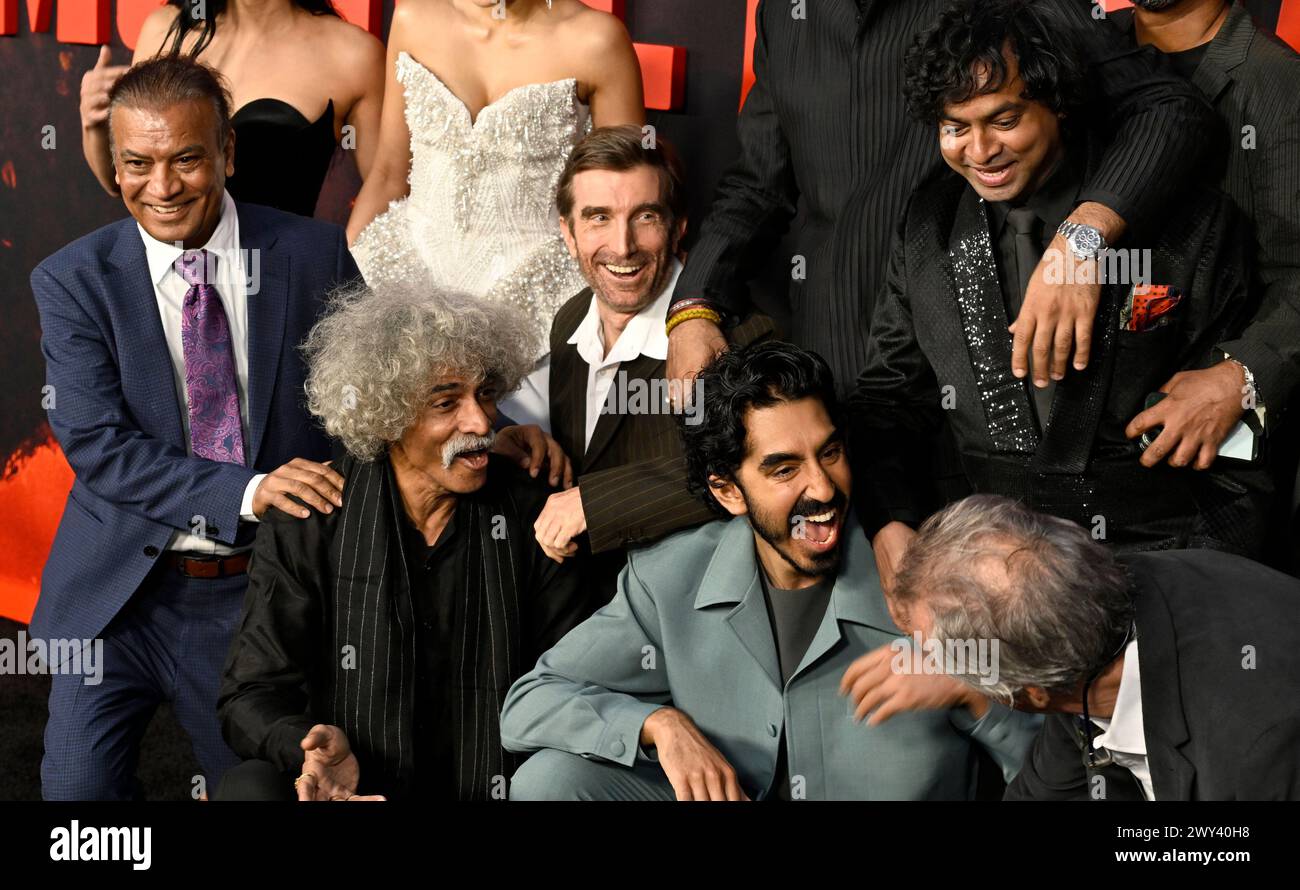 Cast member, producer and director Dev Patel, second from bottom right
