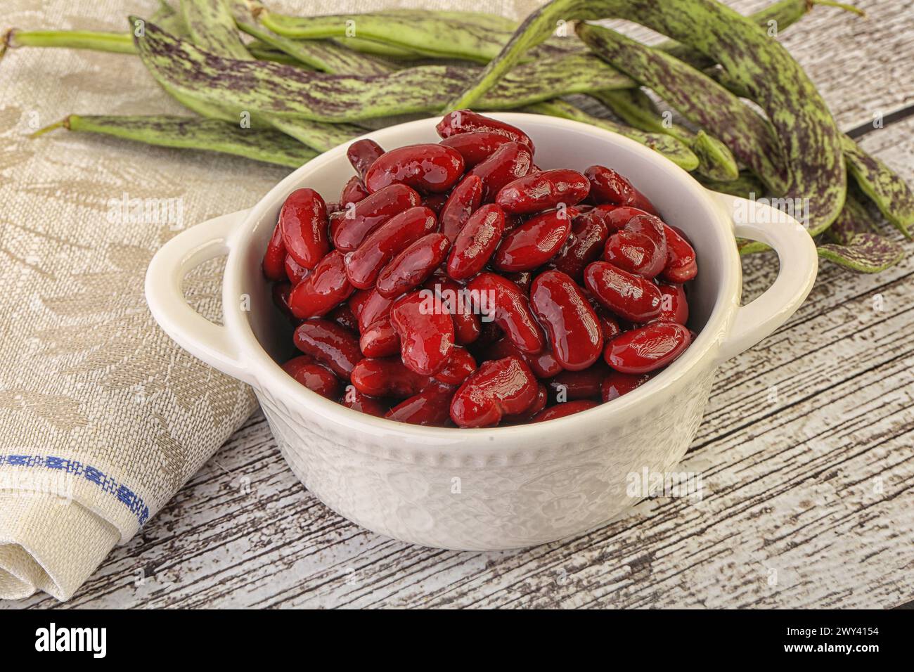 Baked red canned bean snack in the bowl Stock Photo - Alamy