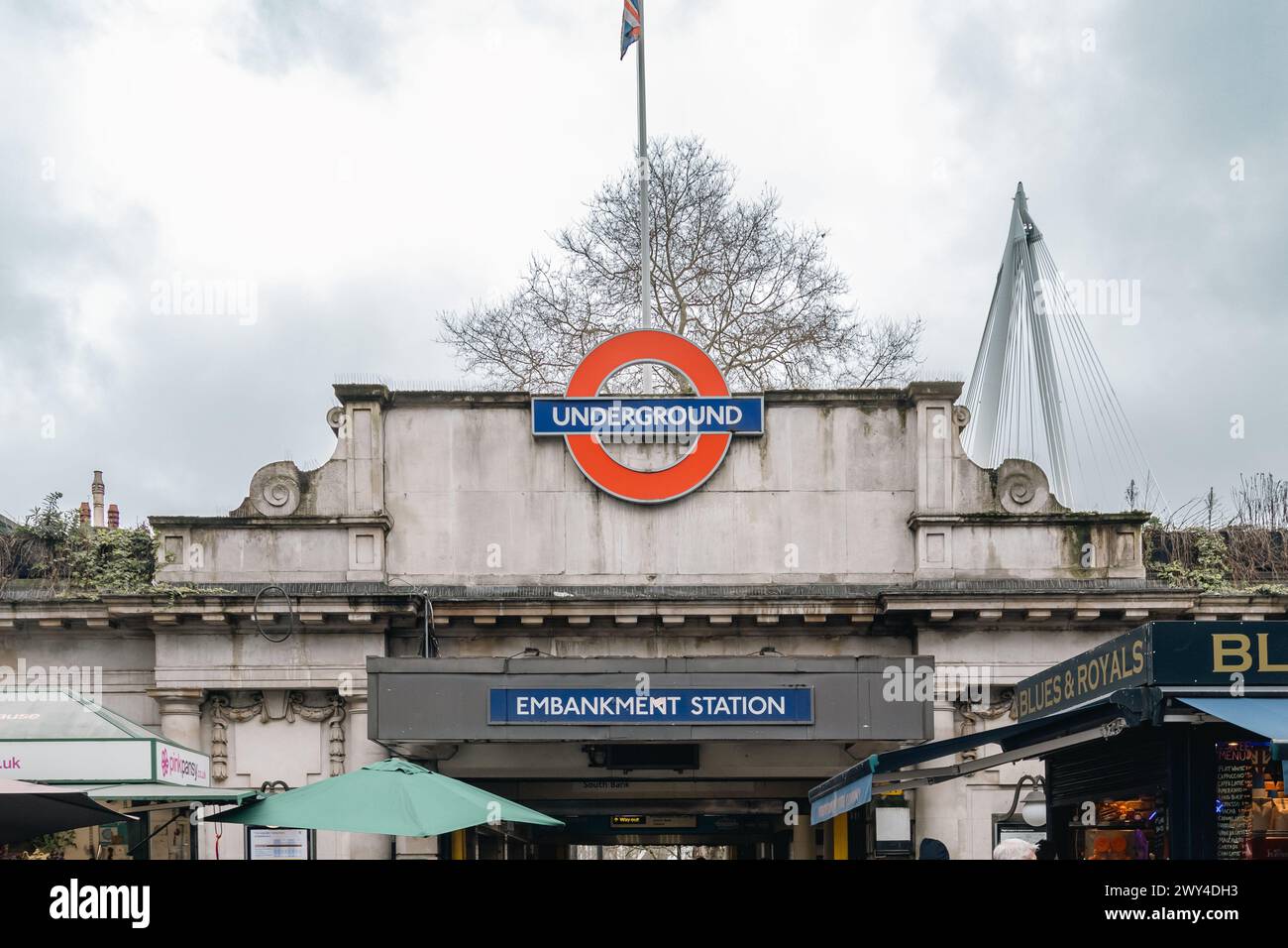 Close-up of Embankment Tube Station exterior with prominent Underground and Embankment Station signs. Stock Photo