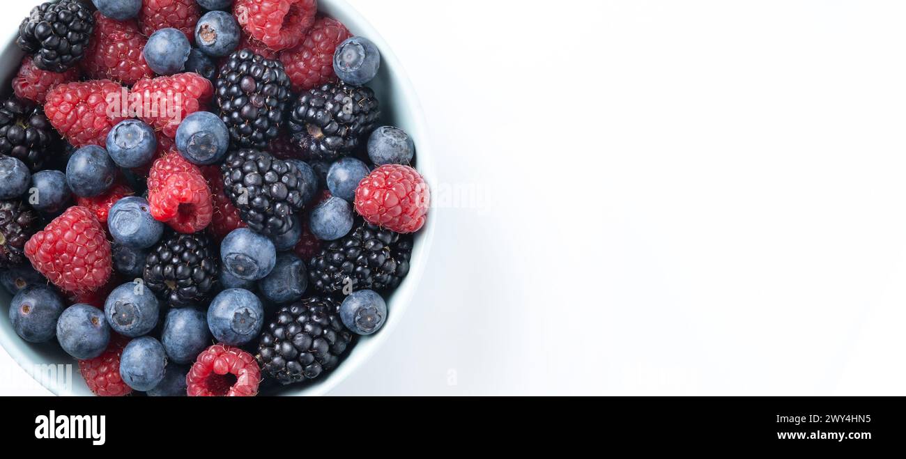 Fresh assortment berries isolated on white background Stock Photo