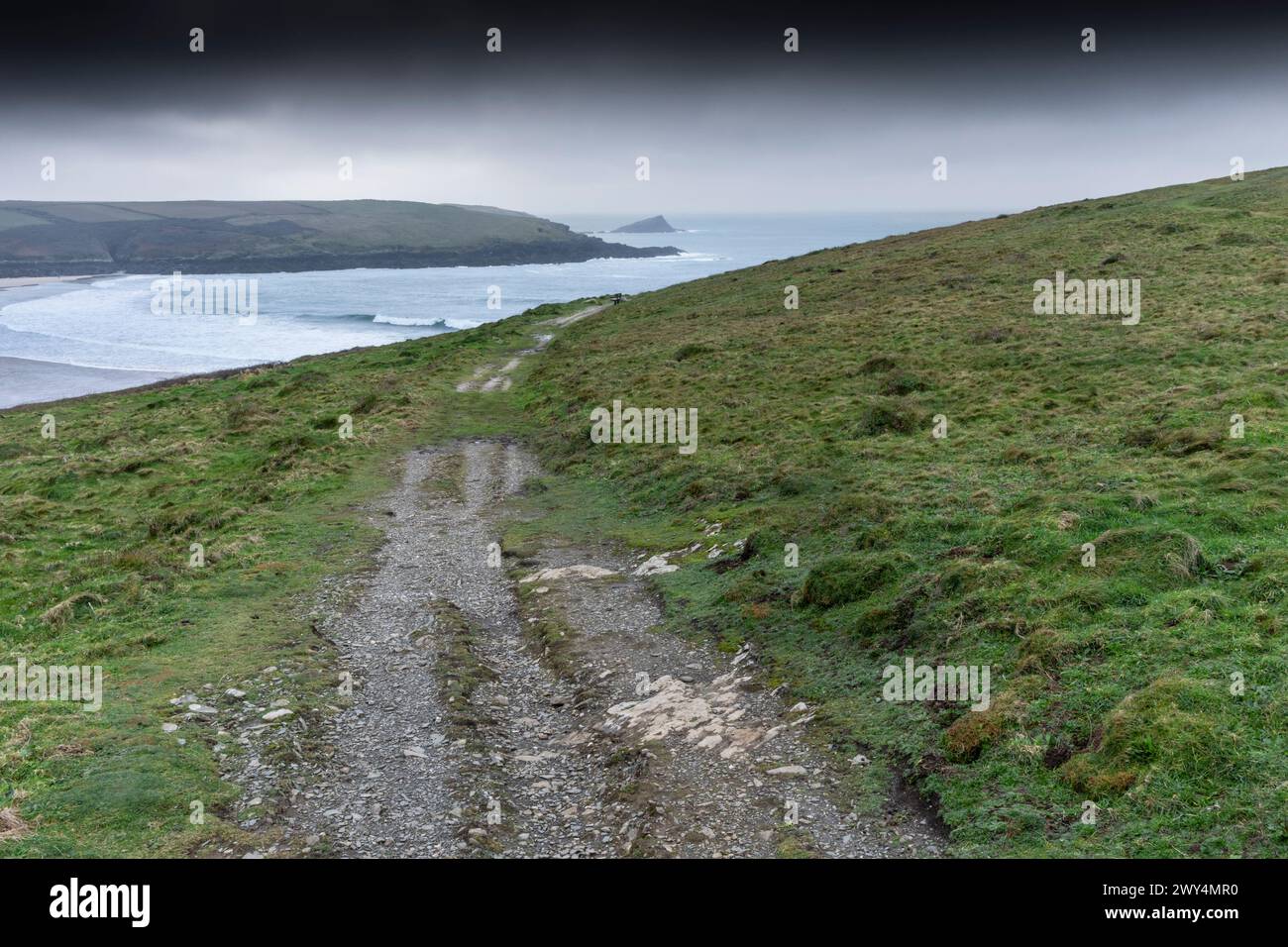 A rough track on the bleak windswept Pentire Point East in Newquay in Cornwall in the UK. Stock Photo