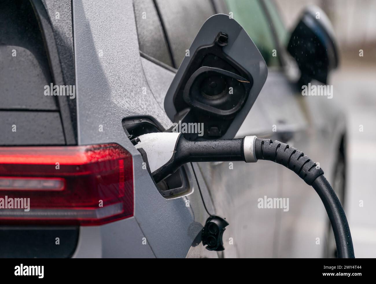 An electric vehicle charging station at Skelton Lake Service Station in ...