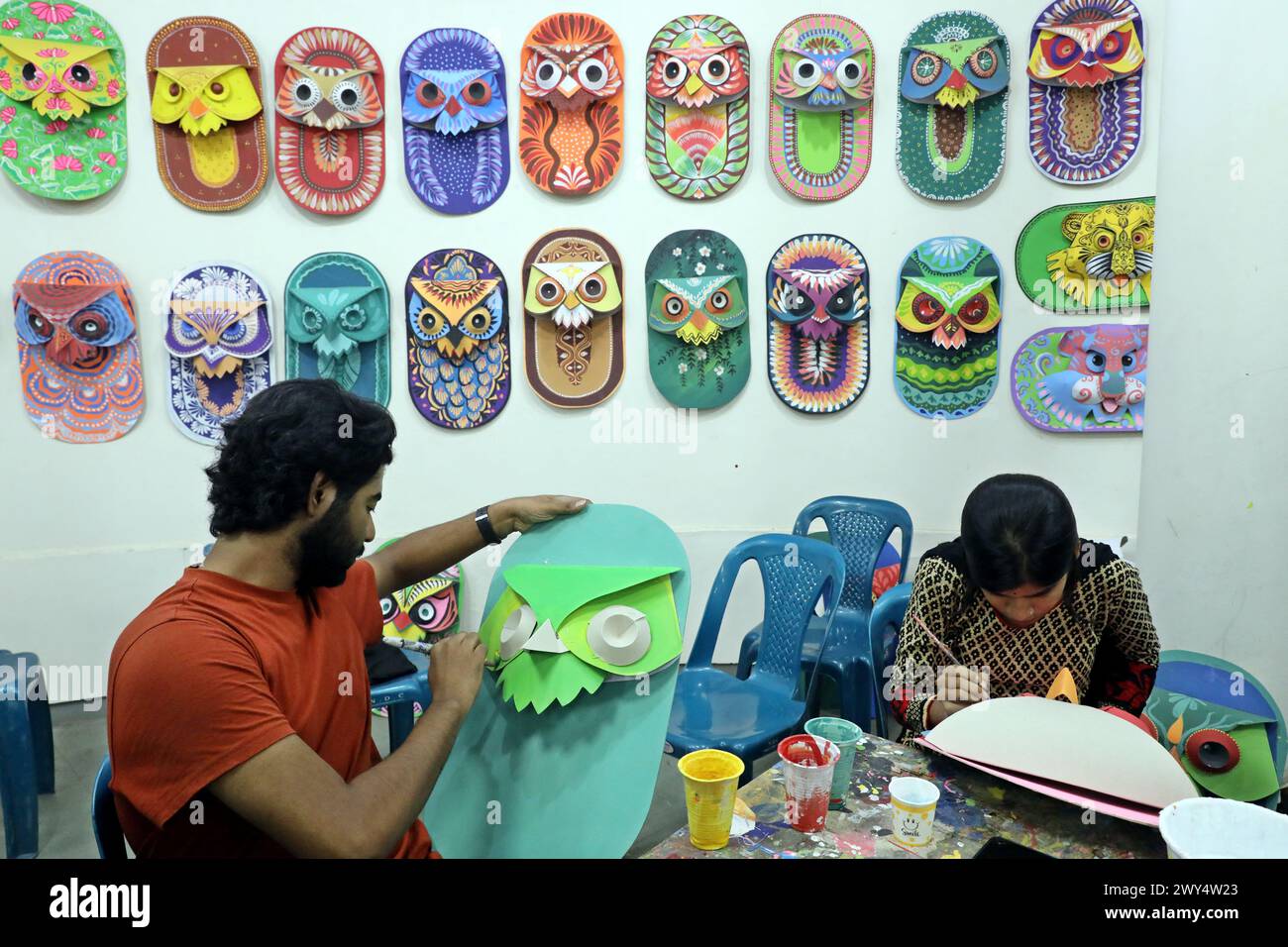 Dhaka, Bangladesh. 02nd Apr, 2024. Students from the Faculty of Fine Arts at Dhaka University are painting masks in colorful preparation to celebrate the upcoming Bengali New Year 1431 in Dhaka, Bangladesh, on April 03, 2024. Pahela Baishakh, the first day of the Bangla month, traces its origins back to the Mughal period when Emperor Akbar introduced the Bangla calendar to streamline tax collection, and over time it has become a part of Bengali culture and tradition. Photo by Habibur Rahman/ABACAPRESS.COM Credit: Abaca Press/Alamy Live News Stock Photo