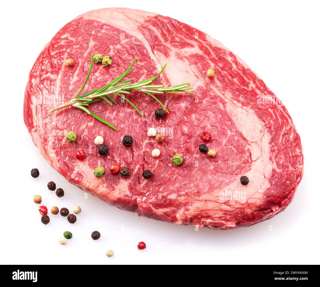 Raw ribeye steak with peppercorn and rosemary isolated on white ...