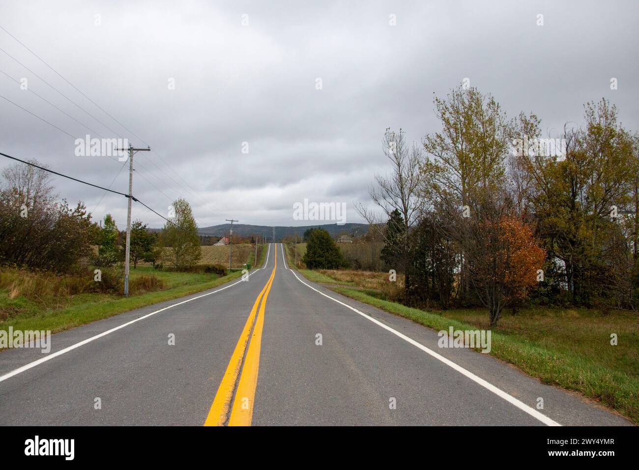 Lonely rural road in hi-res stock photography and images - Alamy