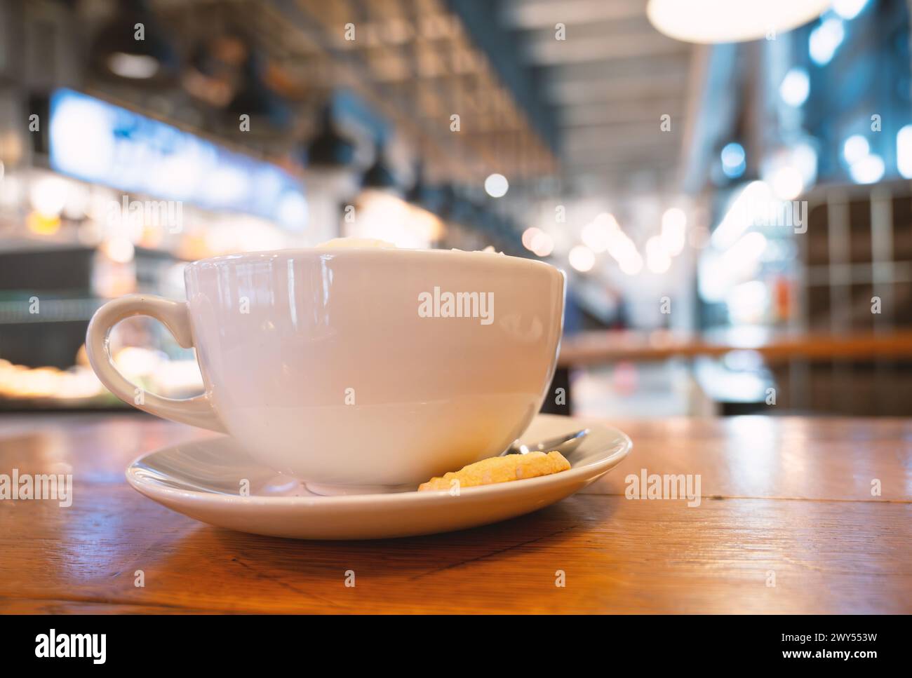 Cup of coffee in a cafe, hot drink with caffeine, breakfast in a restaurant, taking a break Stock Photo
