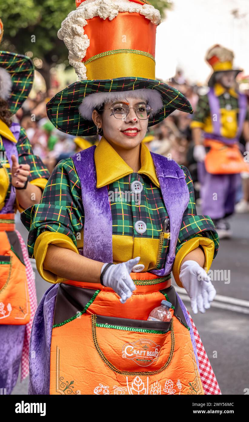 People in elaborate costume marching in the Tenerife Carnival parade