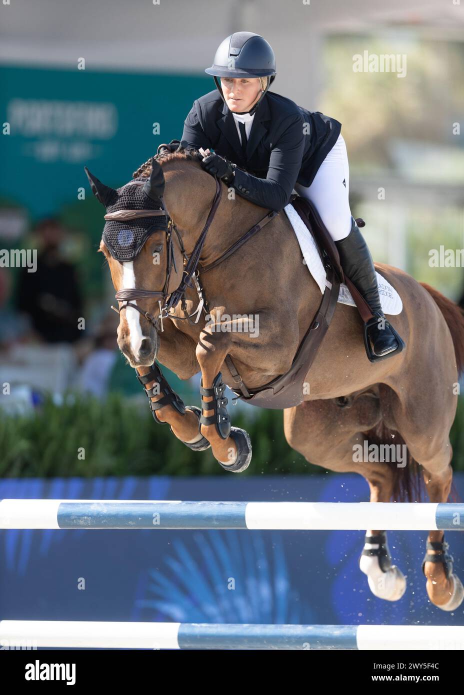 Miami Beach, USA - April 3, 2024. Samantha Schaefer of the USA and riding James Bond HX competes during the 1.40 Speed Class at Longines GCL Miami. Stock Photo
