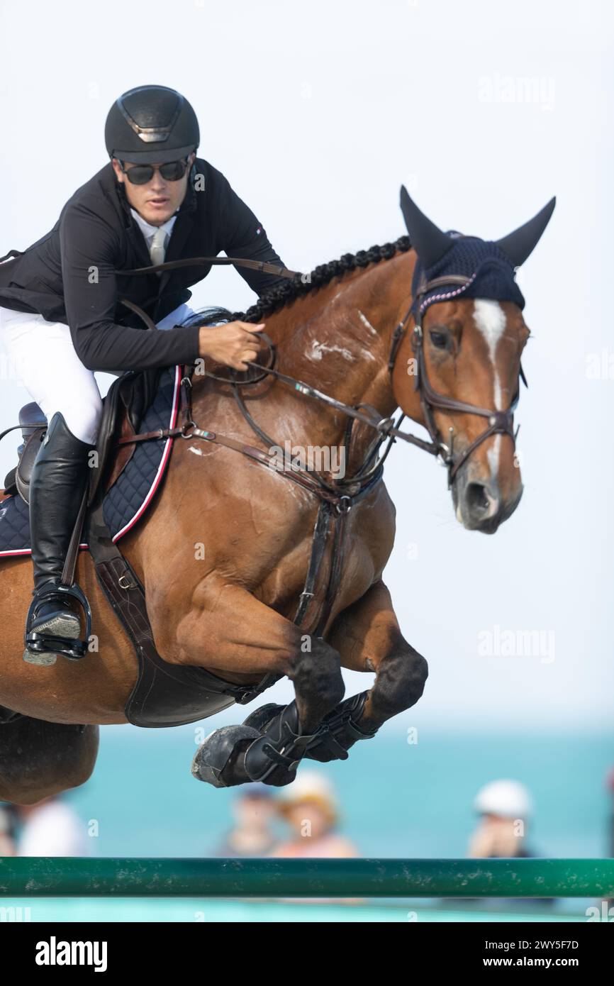 Miami Beach, USA - April 3, 2024. Tanner Korotkin of the USA and riding Ideal competes during the 1.40 Speed Class at Longines GCL Miami. Stock Photo