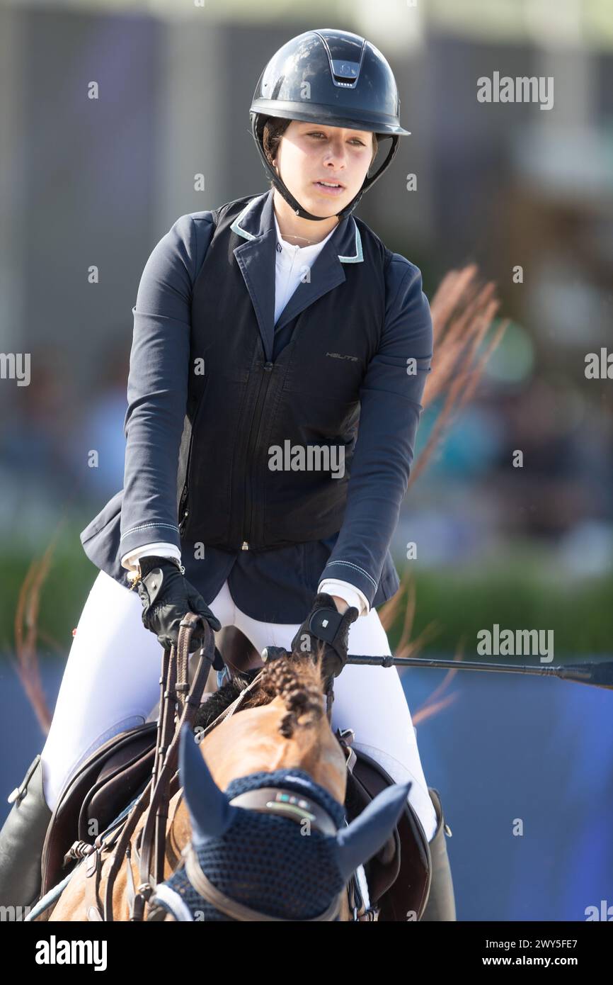 Miami Beach, USA - April 3, 2024. Clara Propp of the USA  riding Cocolina competes during the 1.40 Speed Class at Longines GCL Miami. Stock Photo