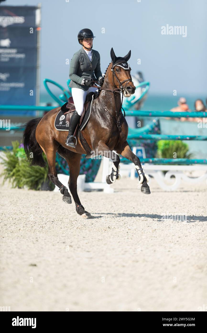 Miami Beach, USA - April 3, 2024. Hailey Royce of the USA and riding Ogue Ardkyle competes during the 1.40 Speed Class at Longines GCL Miami. Stock Photo