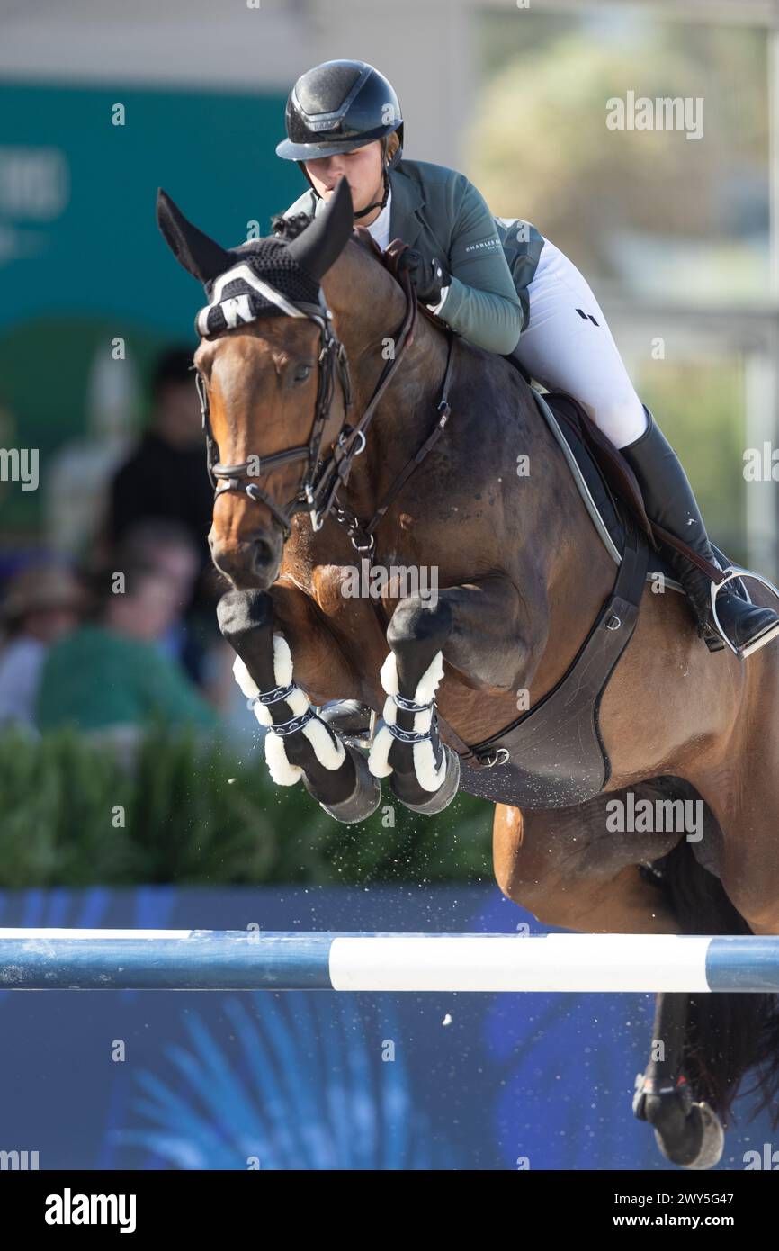 Miami Beach, USA - April 3, 2024. Hailey Royce of the USA and riding Ogue Ardkyle competes during the 1.40 Speed Class at Longines GCL Miami. Stock Photo