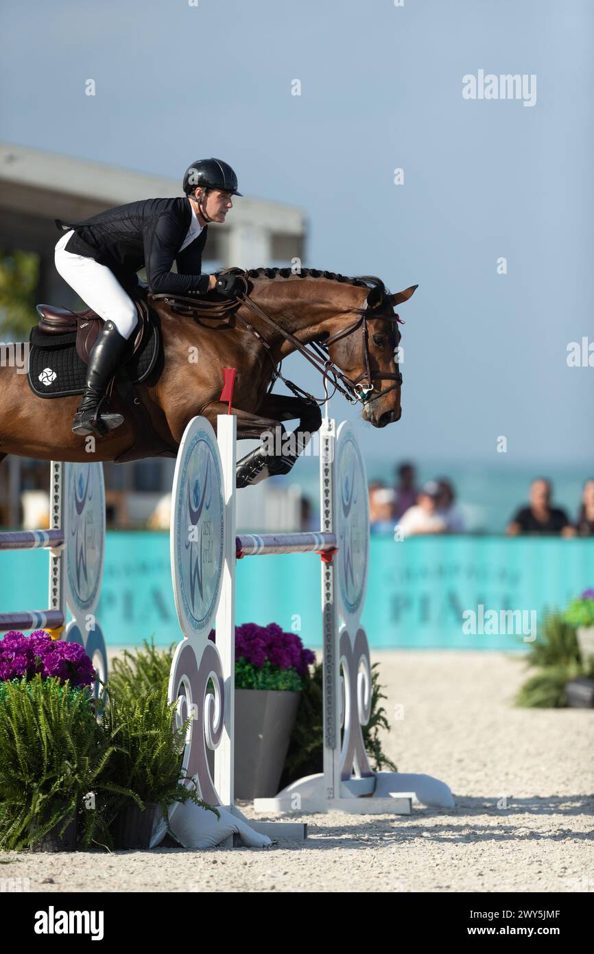 Miami Beach, USA - April 3, 2024. Peter Lutz of the USA and riding Laguna HX competes during the 1.40 Speed Class at Longines GCL Miami. Stock Photo