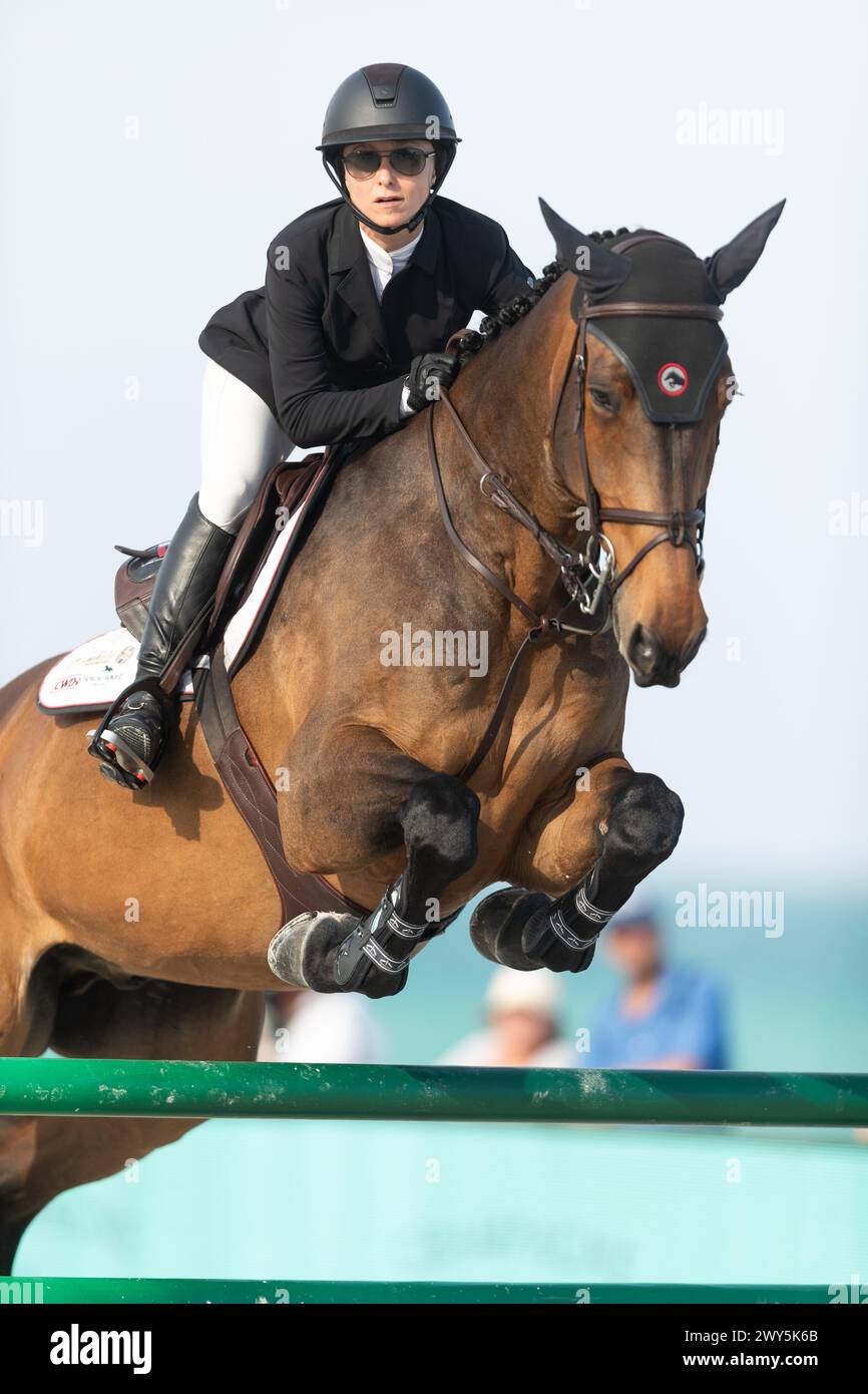 Miami Beach, USA - April 3, 2024. Georgina Bloomberg of the USA and riding Malou Blue PS competes during the 1.40 Speed Class at Longines GCL Miami. Stock Photo