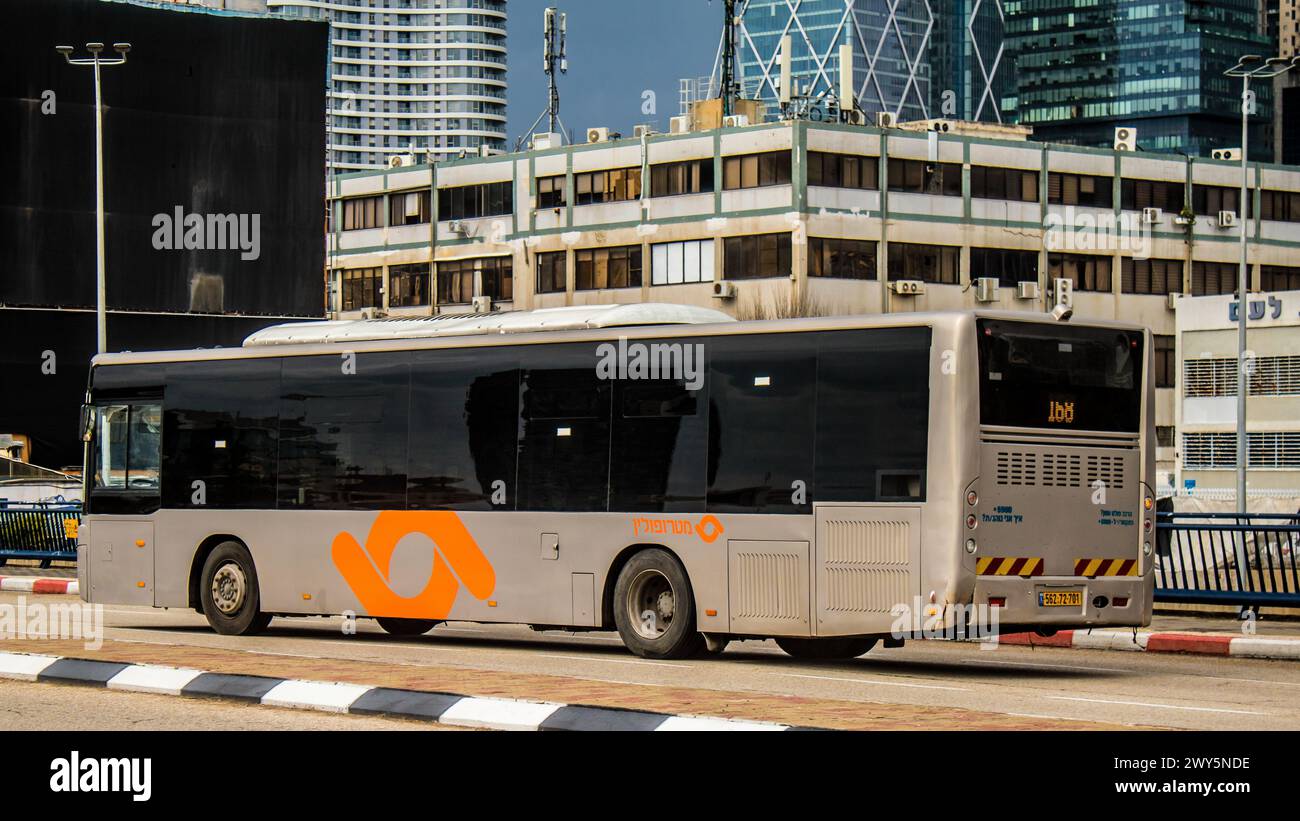 Tel Aviv, Israel - January 28, 2024 Local bus driving in the downtown ...