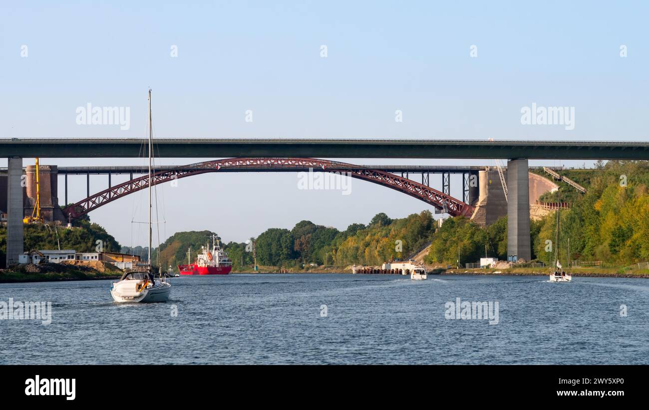 Boats on Kiel Canal passing Levensau High Bridge, Schleswig-Holstein, Germany Stock Photo