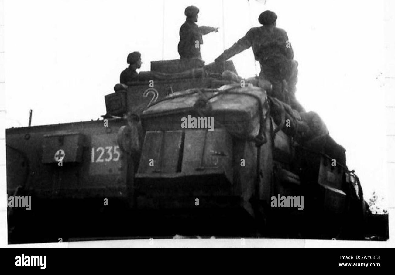 Commandeered A Tank A tank commander directs troops by issuing final instructions and ...