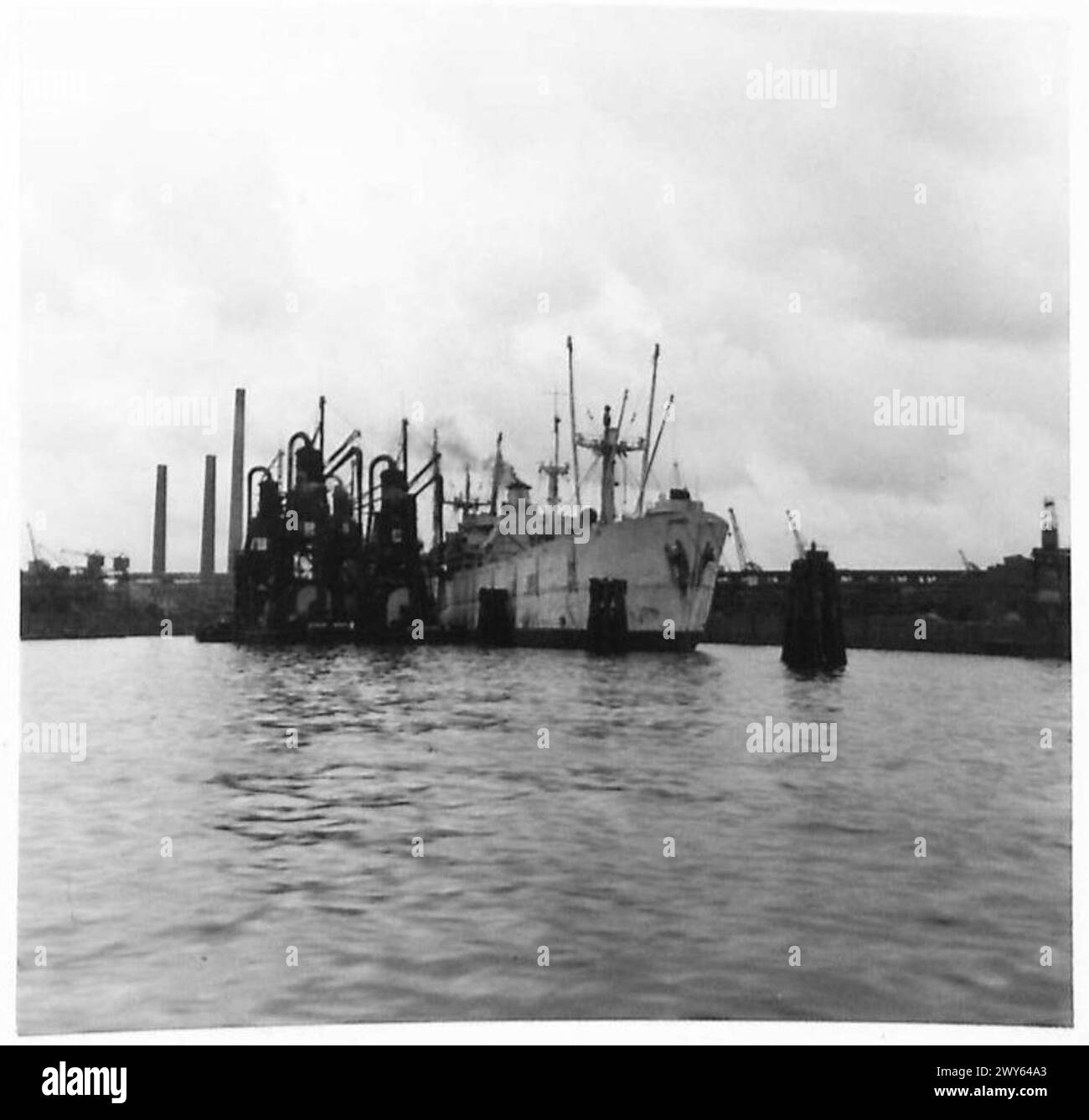 Q.M.G. VISITS HAMBURG HARBOUR - Docks being used by Allied shipping. , British Army, 21st Army Group Stock Photo