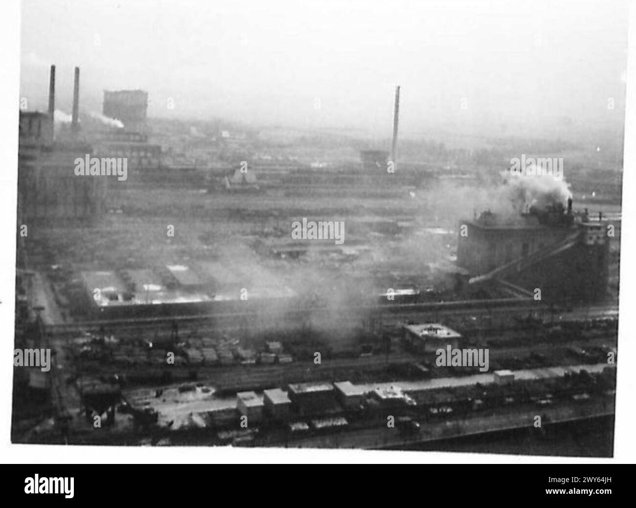 BRITISH SOLDIERS VISIT COAL MINE IN HOLLAND - From the mines slag heap ...