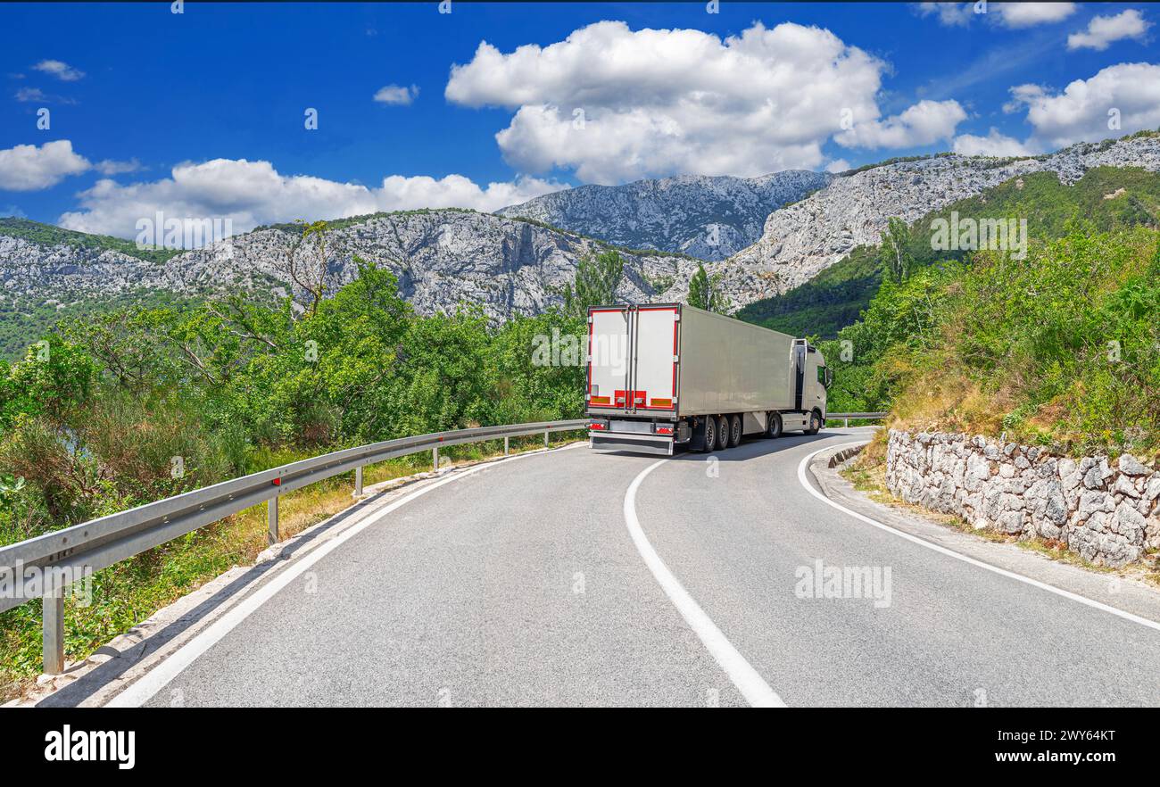 Truck on a mountain road Stock Photo - Alamy