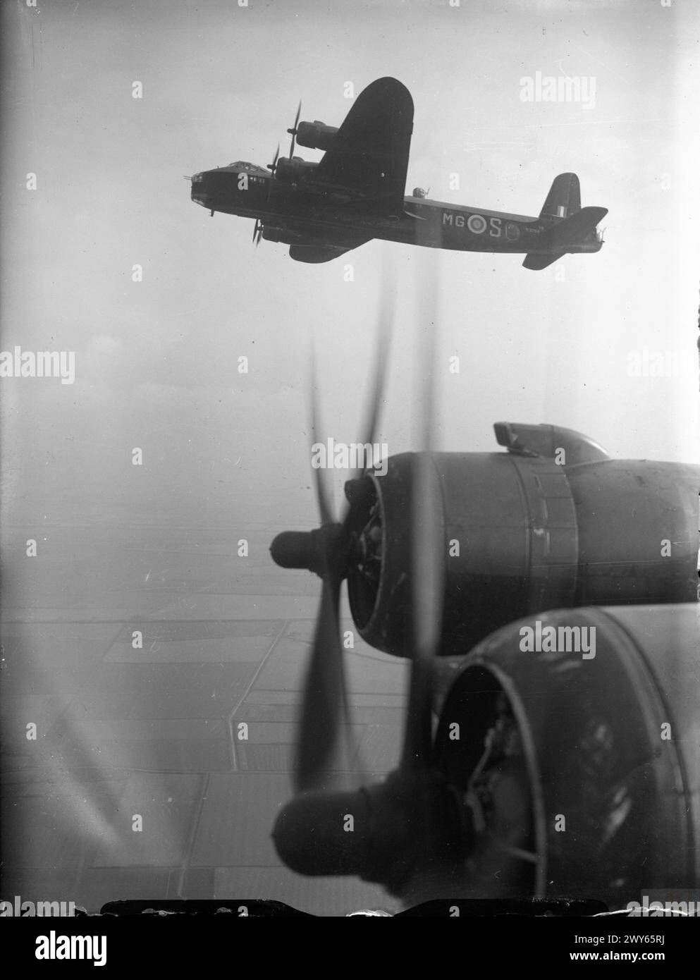 ROYAL AIR FORCE BOMBER COMMAND, 1942-1945. - Short Stirling Mark I, N3706 'MG-S', of No, 7 Squadron RAF based at Oakington, Cambridgeshire, in flight above the starboard wing of another aircraft of the Squadron. , Royal Air Force, 7 Squadron Stock Photo