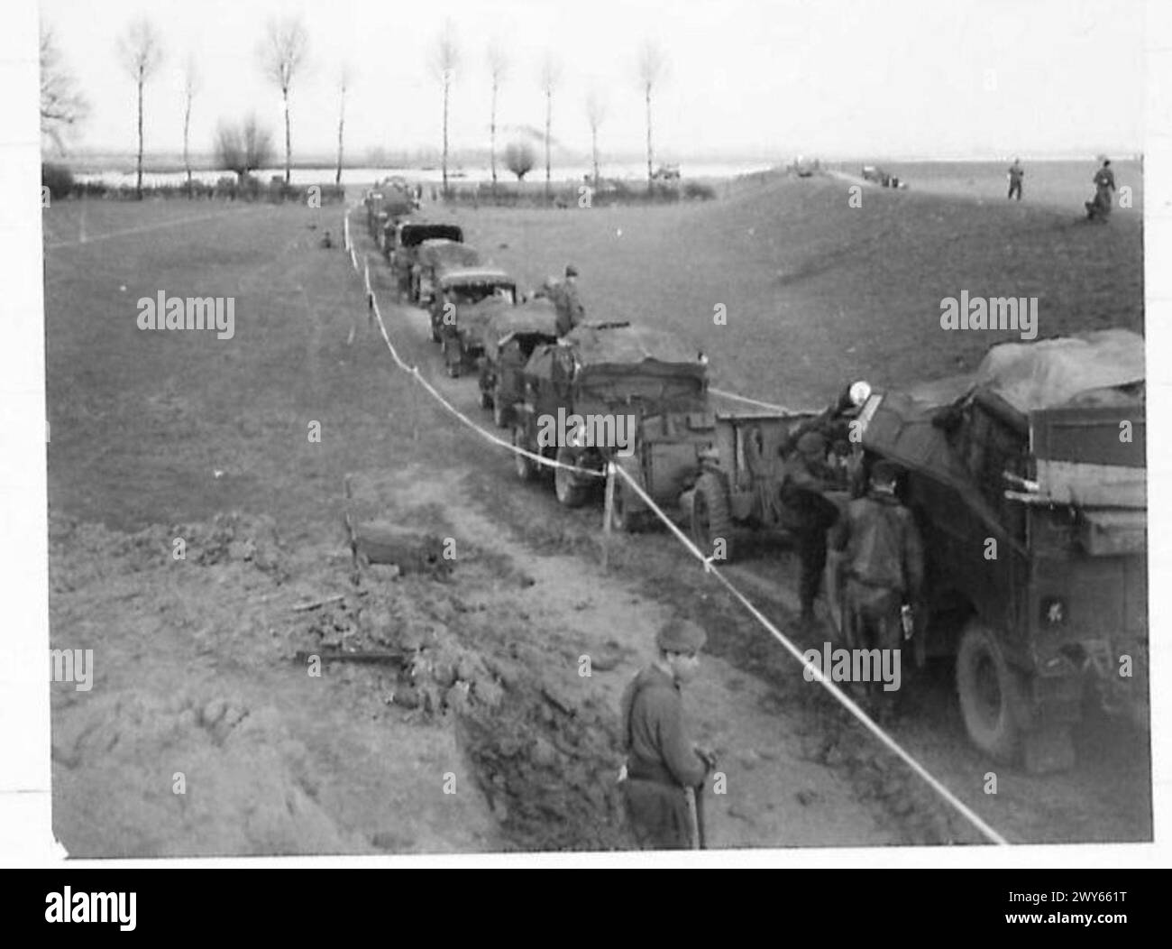 "WATERLOO BRIDGE" OVER THE RHINE Guns and transport waiting to go