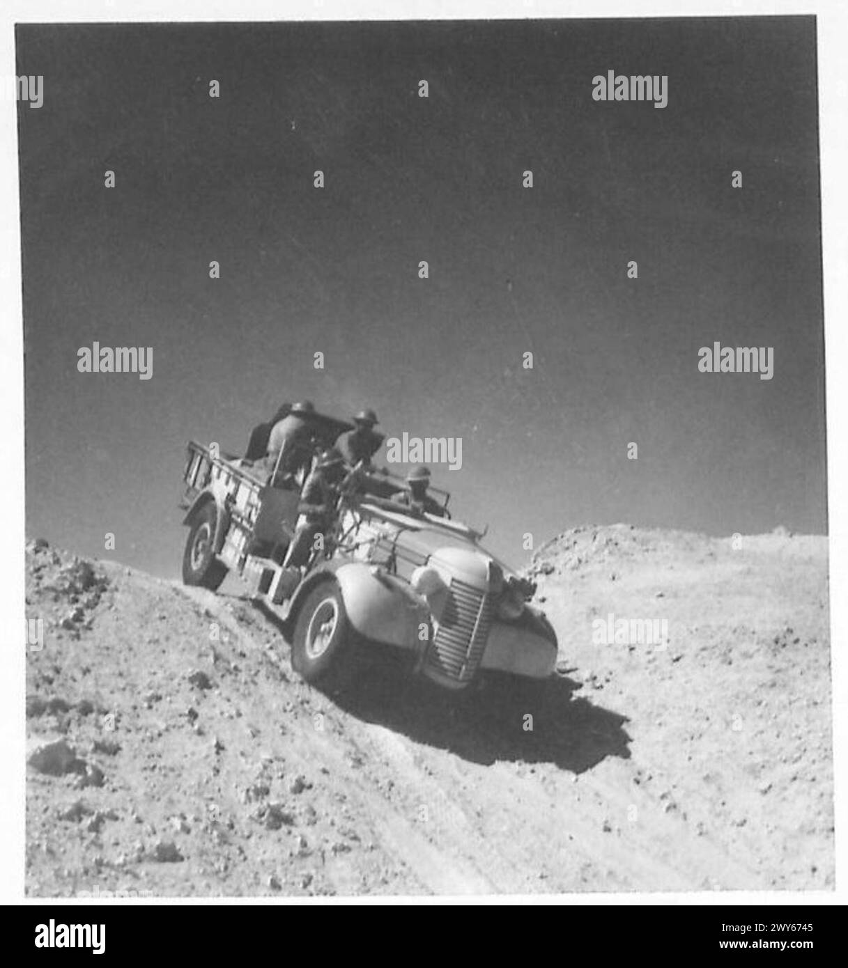 THE BRITISH ARMY IN NORTH AFRICA 1941 - A patrol of the Long Range Desert Group in the Western Desert. Photo shows - vehicle covering difficult terrain. , Stock Photo