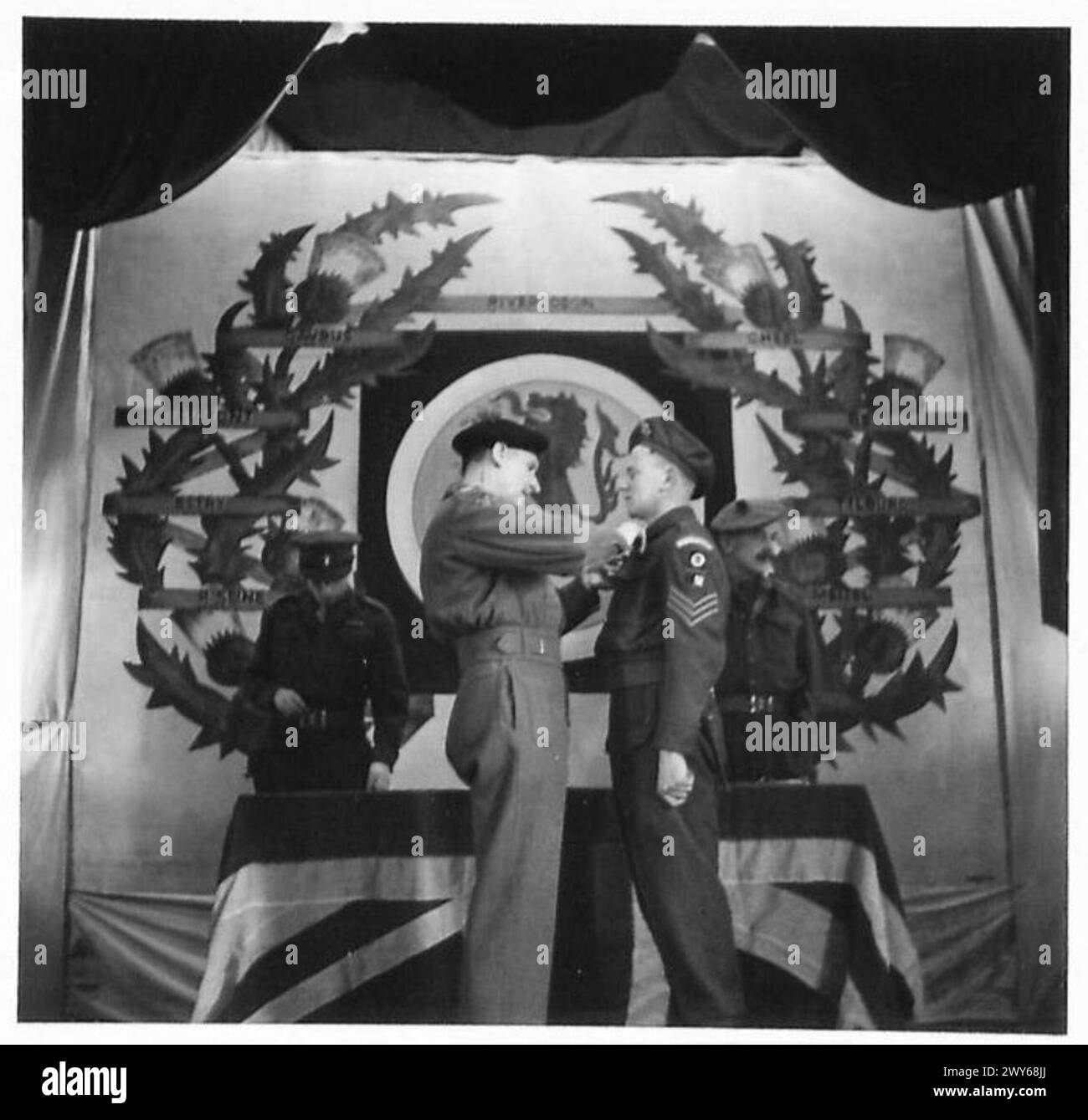 Sgt Reed Sgt. D. Reed of 1 Middlesex receives the Military Medal during the 15th ...