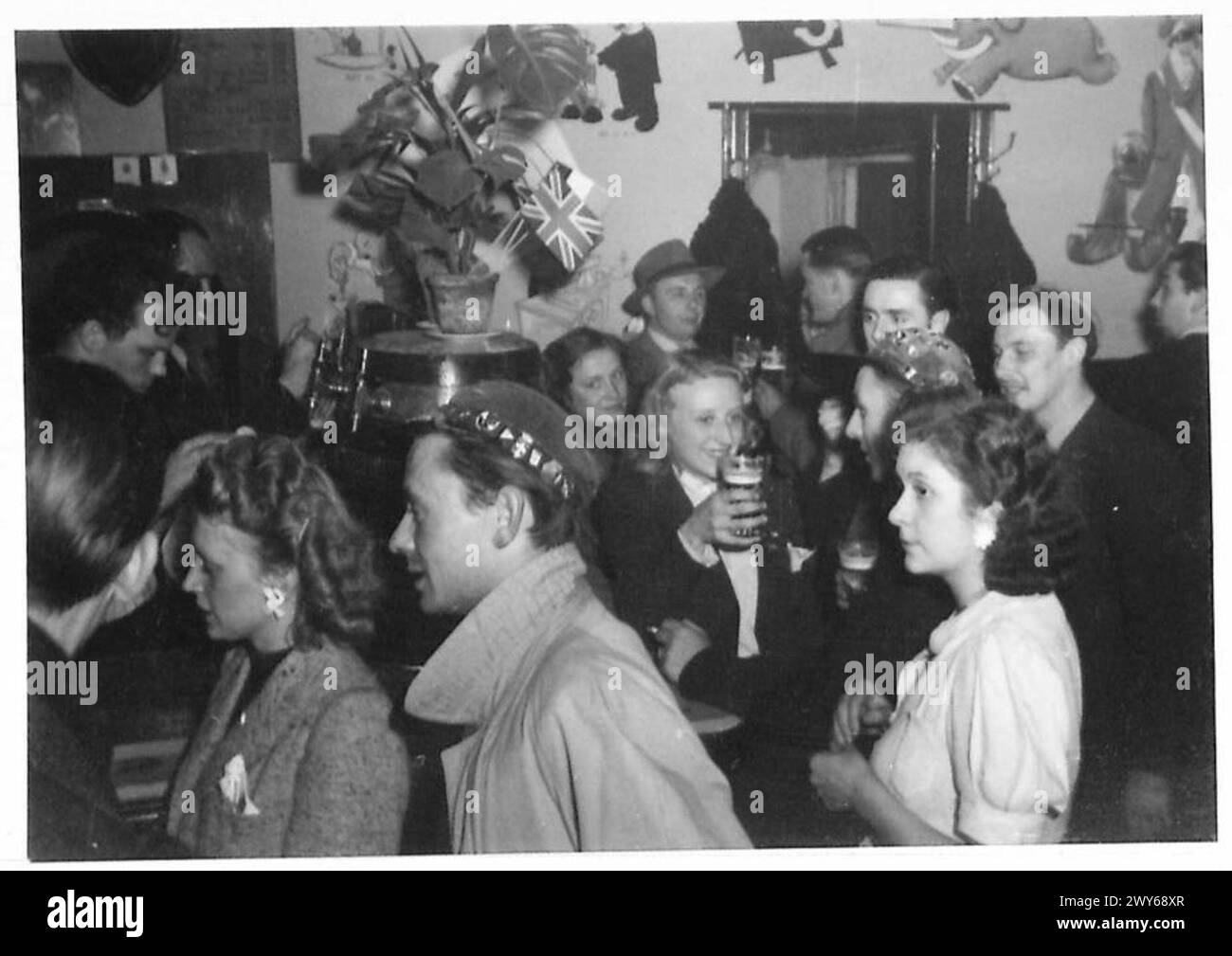 SCENES IN A STUDENTS' CAFE IN BRUSSELS Pictures taken in the "Wooden