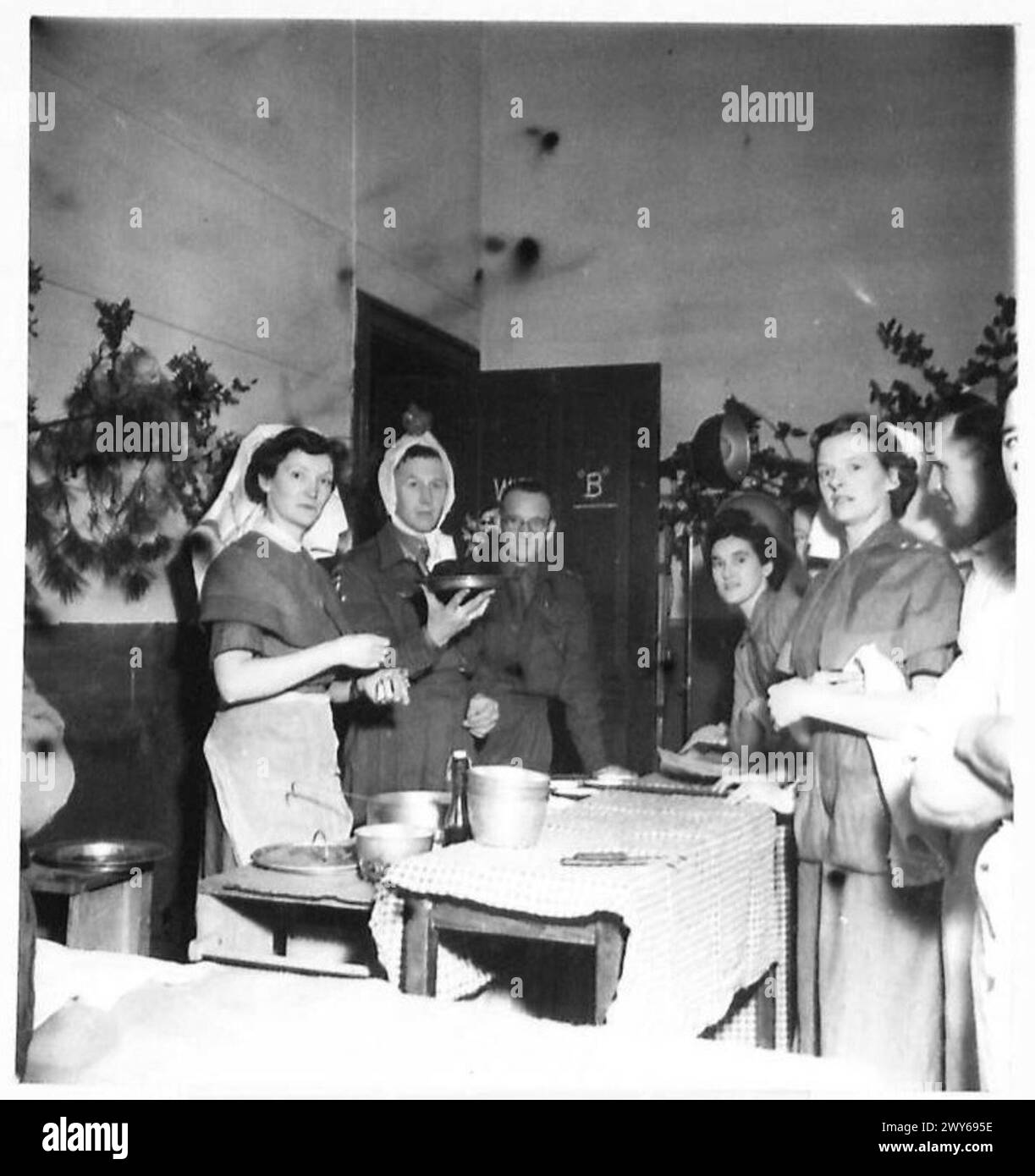 XMAS IN HOSPITAL - The Pudding's Lit Up ---- And all done by brandy, real brandy. , British Army, 21st Army Group Stock Photo