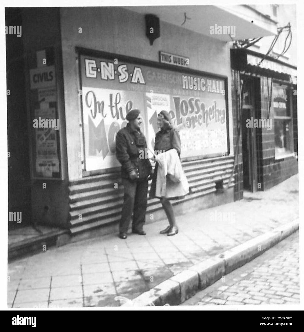 ARMY FILM UNIT CAMERAMAN MEETS ENSA WIFE - The rendezvous outside the ...