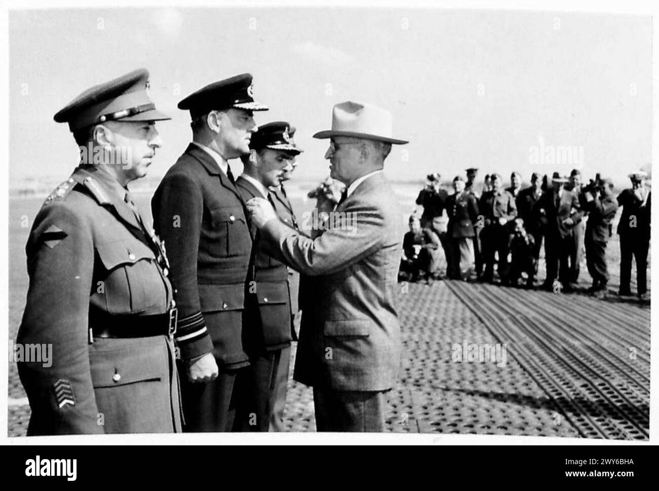 AWARD OF U.S.A. DISTINGUISHED SERVICE MEDAL TO BRITISH AND CANADIAN