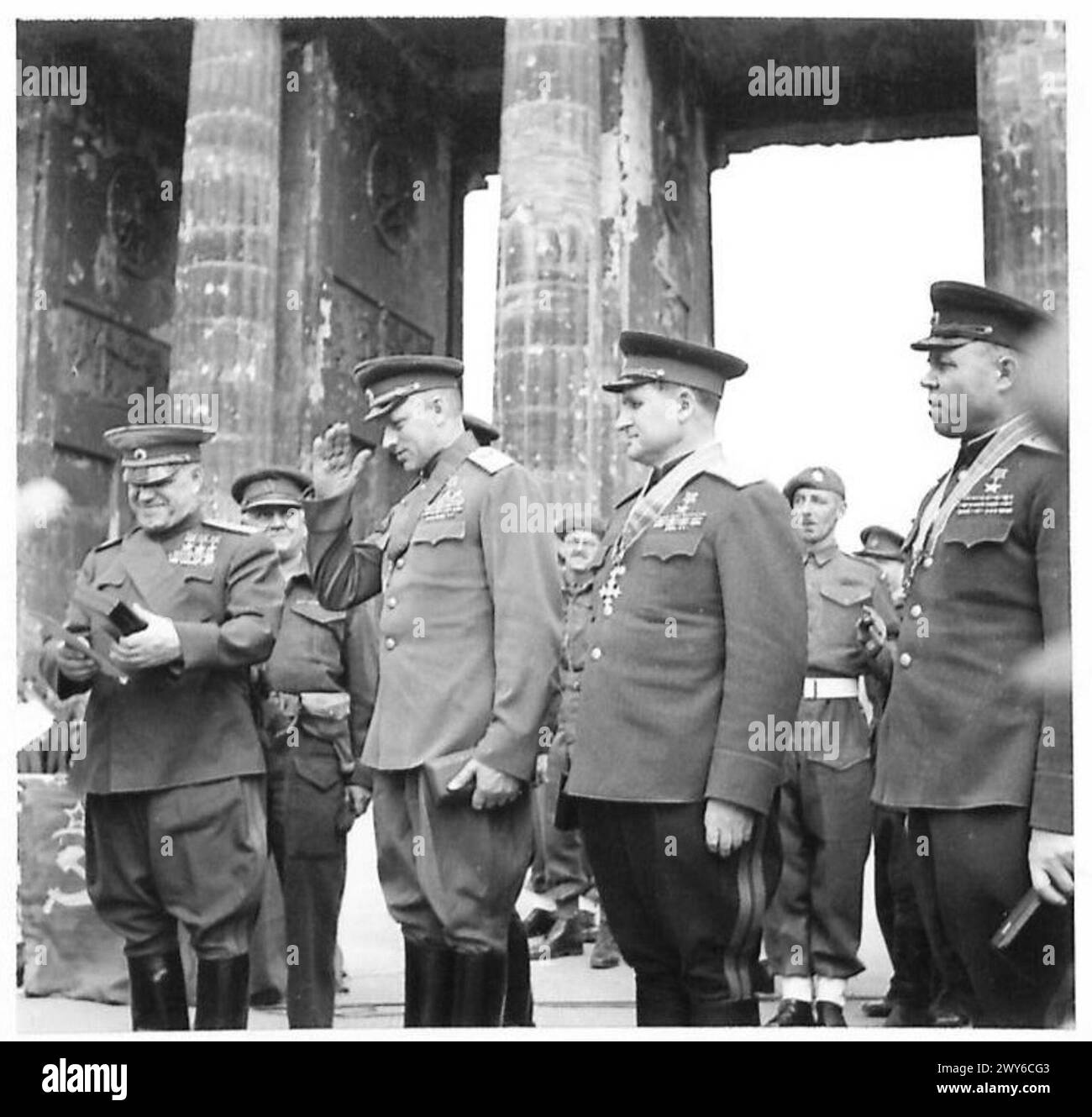 INVESTITURE OF RUSSIAN GENERALS BY FIELD MARSHAL MONTGOMERY - Left to right - Marshal Zhukov General Rokossovsky Colonel General Sokolovski with their decorations. , British Army, 21st Army Group Stock Photo