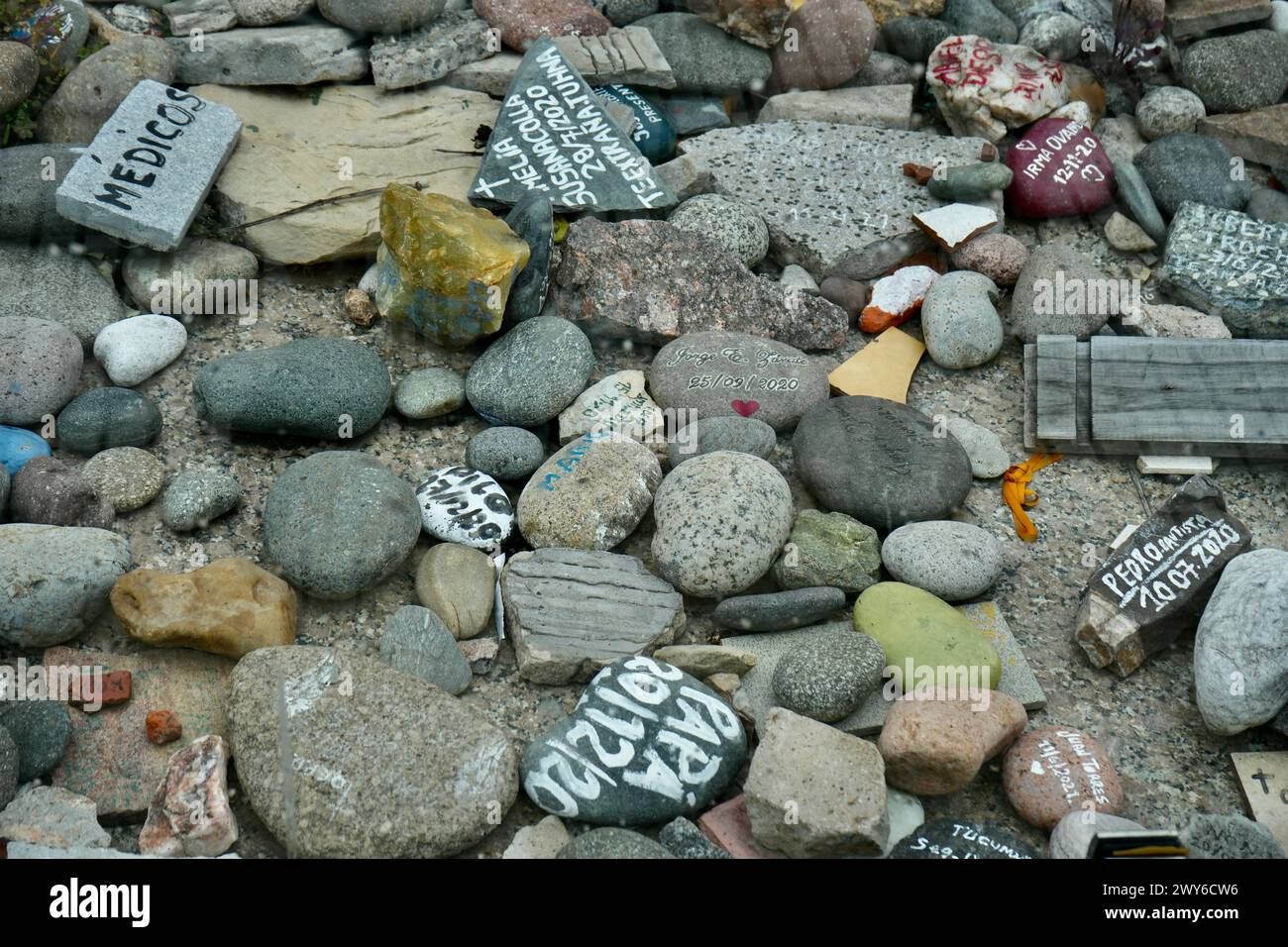 Stones under the statue of General Belgrano in Plaza De Mayo in memory of the COVID victims in Argentina. Stock Photo