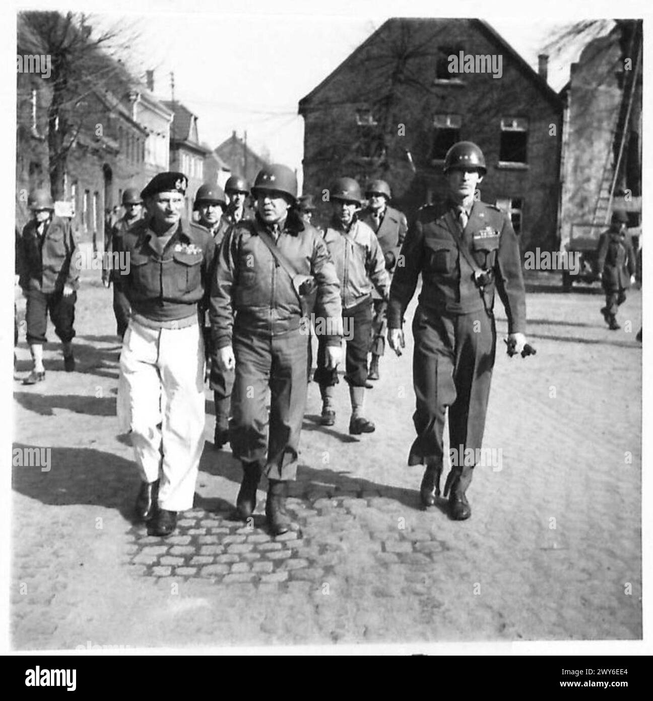 FIELD MARSHAL MONTGOMERY WATCHES RHINE CROSSING REHEARSAL - The three