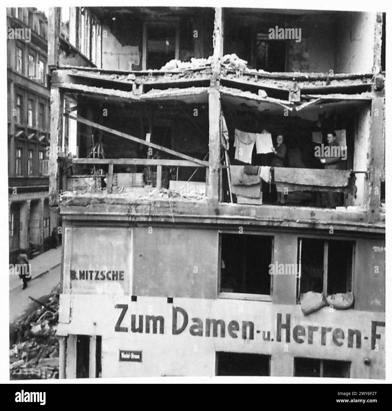 HAMBURG AT PEACE AGAIN - Herr Ernst Stade and his wife still have to live in their house in the Winckel Strasse in spite of only having three walls. The housing shortage is far worse in Hamburg than in England, a compliment to the R.A.F. , British Army, 21st Army Group Stock Photo