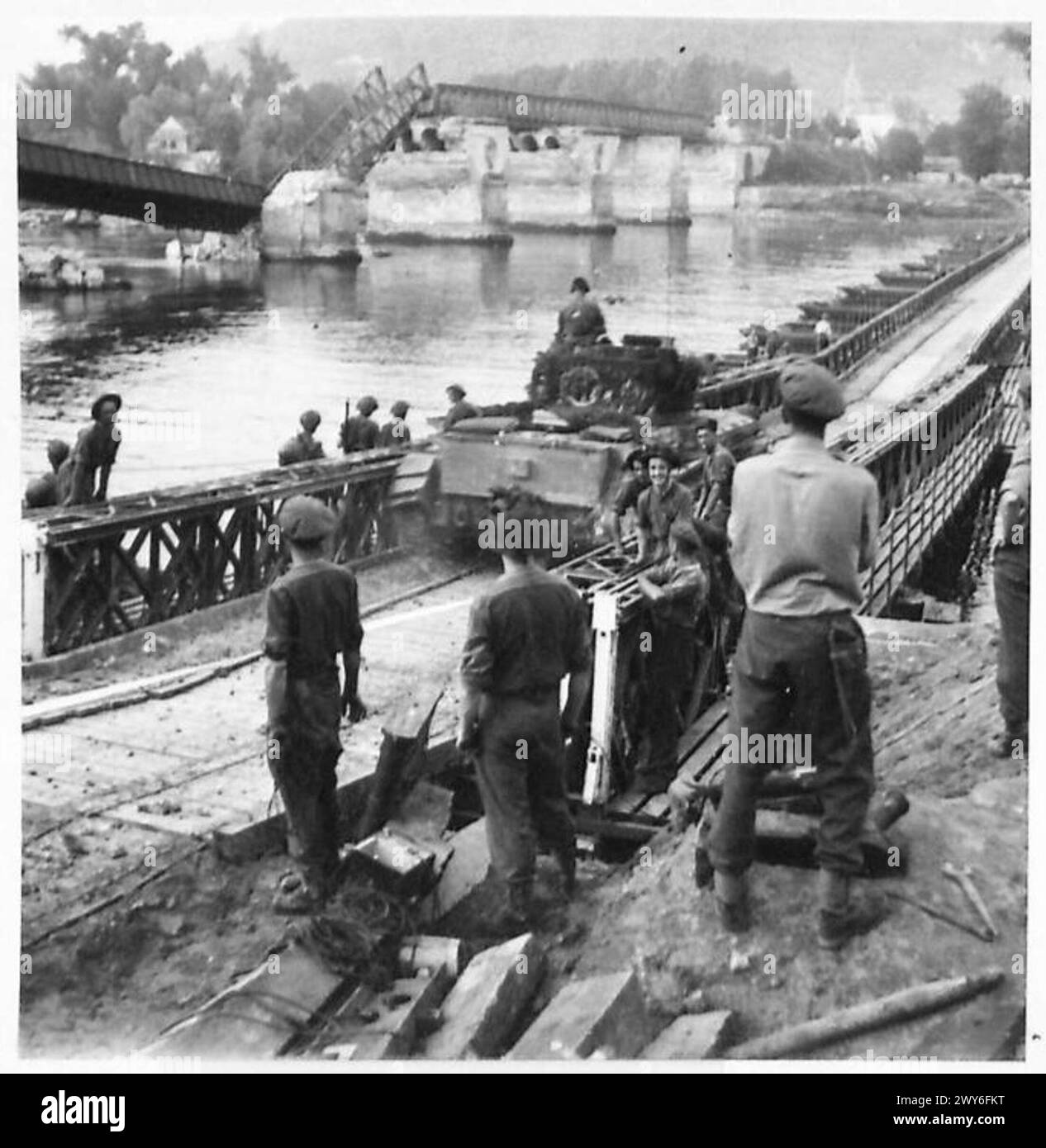CROSSING THE SEINE BRIDGES The Sherman tanks start rolling over the