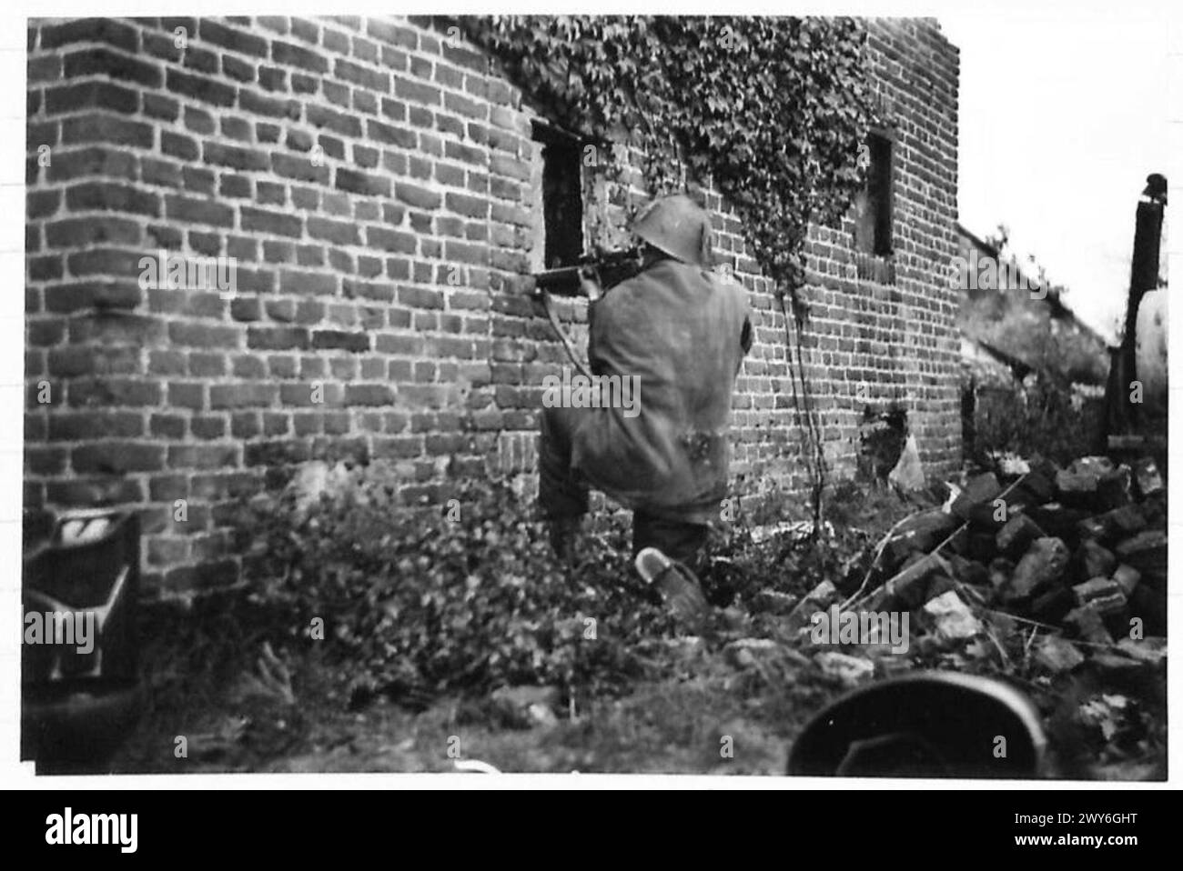 THE BATTLE FOR VENRAY. - L/Cpl J. Dudley aged 33 of Barnsley, who is the sniper for his Coy. is seen in his firing position. , British Army, 21st Army Group Stock Photo