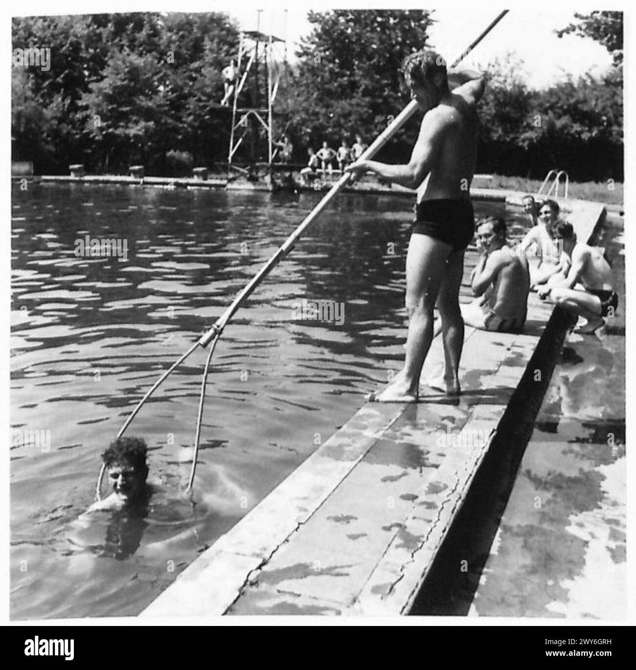 THE LAGOON CLUB [1 Corps] - A learner Pte. R.Evans [left] of Glebe Farm, Birmingham, being taught to swim by Sergeant S.Moore of Doncaster. , British Army, 21st Army Group Stock Photo