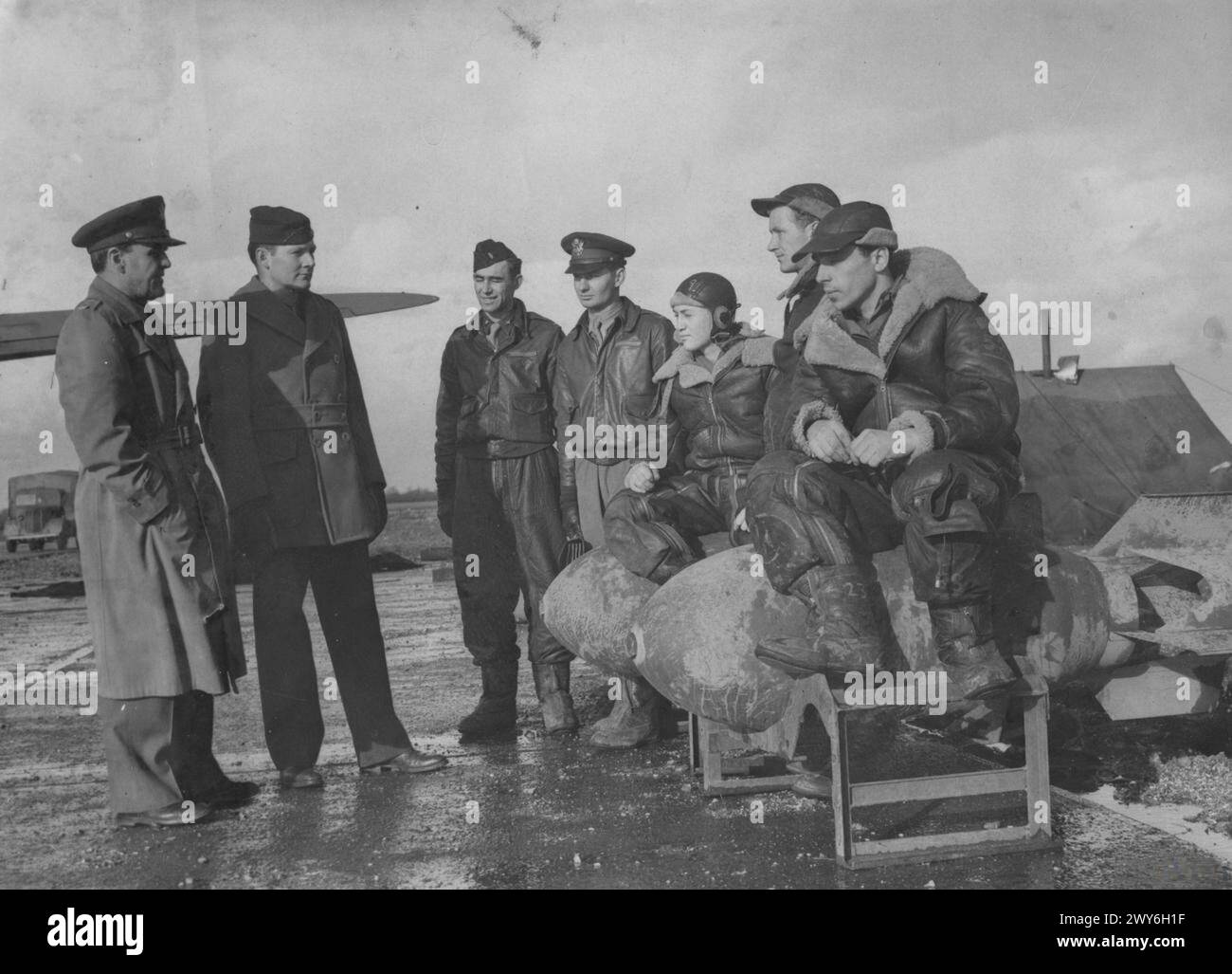 Major John B. Wright and Major Ralph Oliver of the 306th Bomb Group are ...