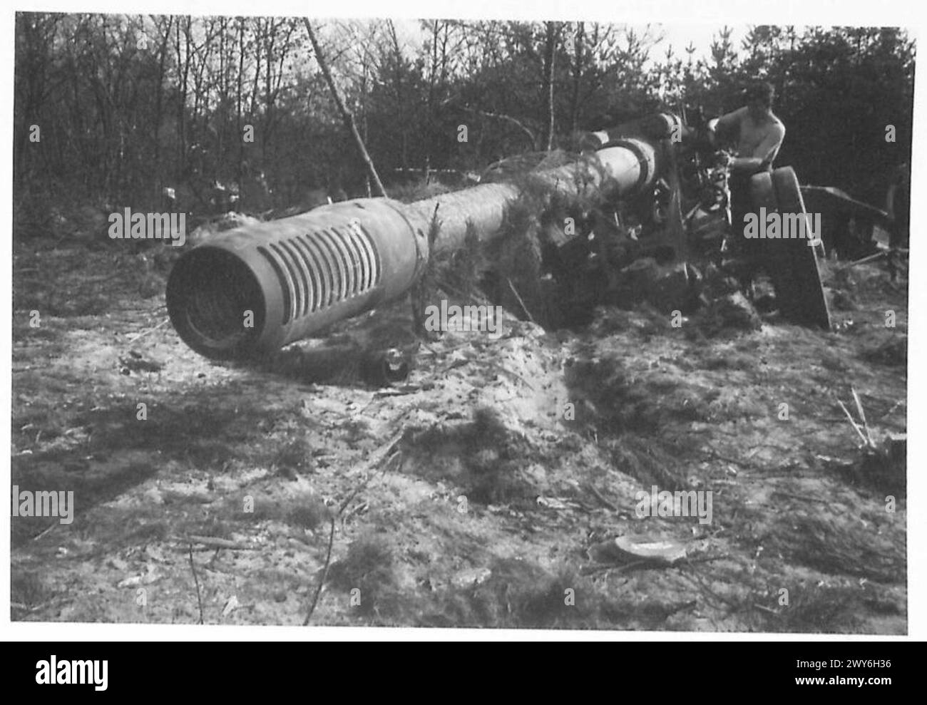 RHINE CROSSING - A German big gun immobilised by our bombing , British
